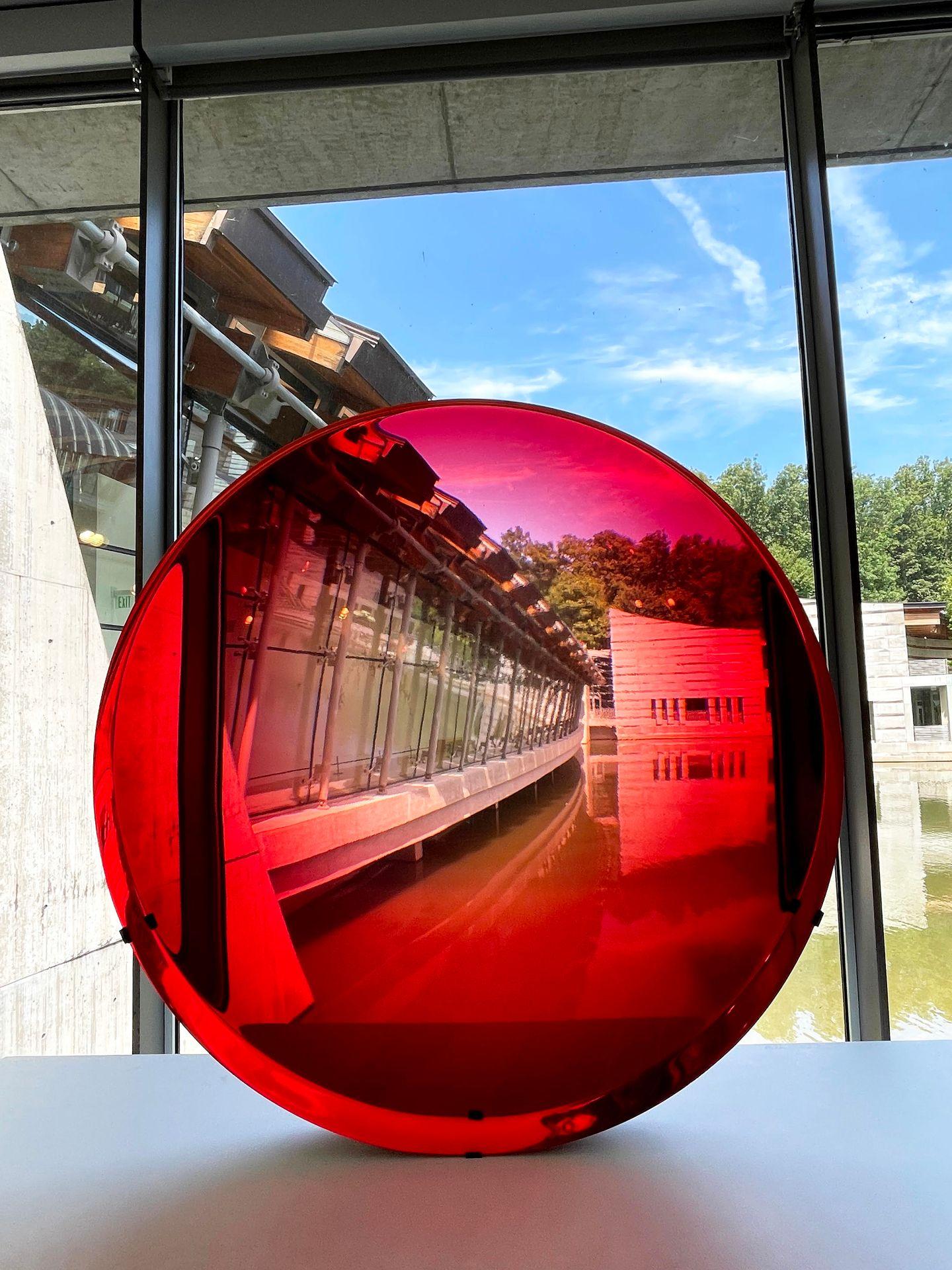 A clear, red circle inside of Crystal Bridges.
