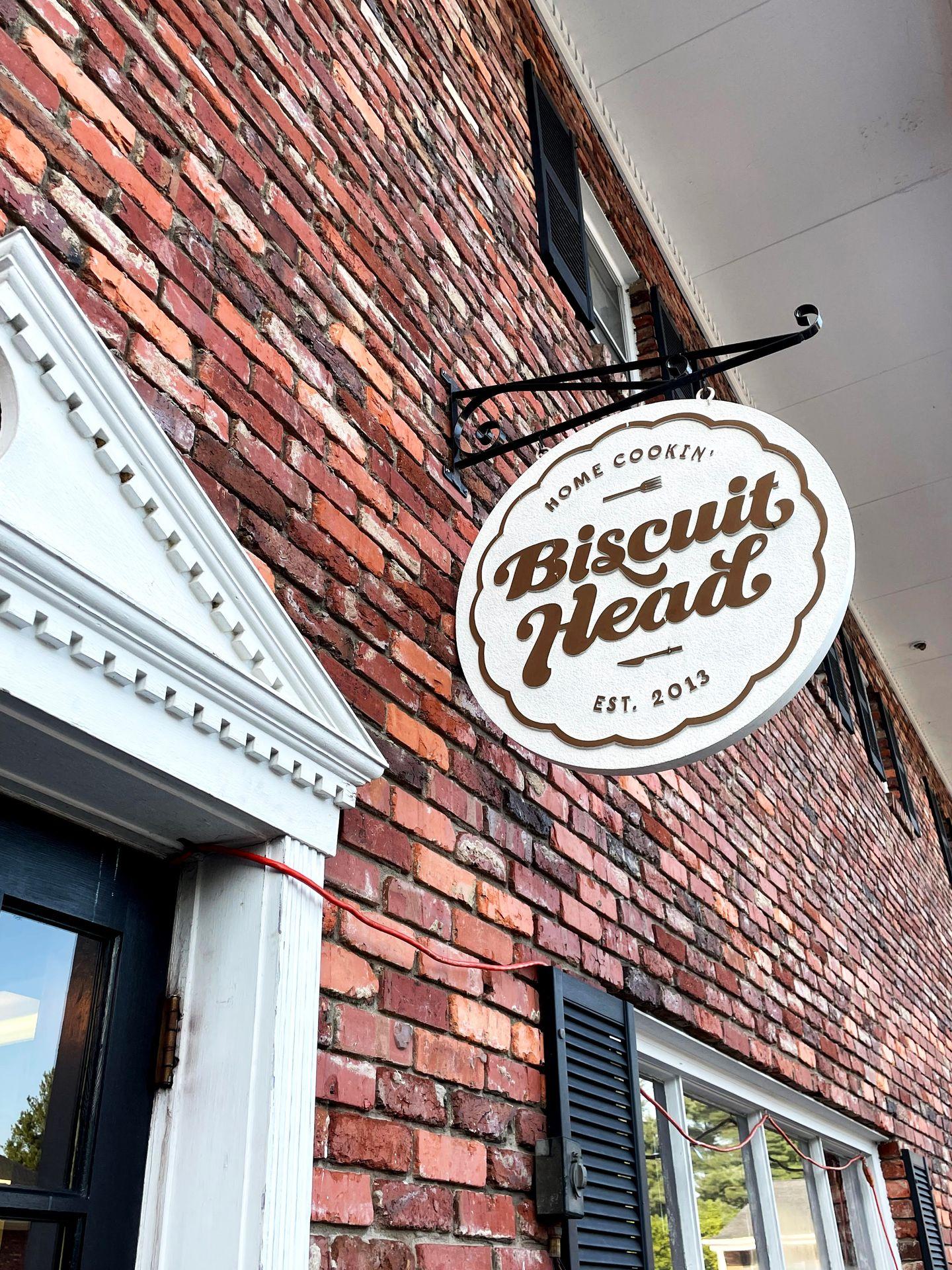 The sign for Biscuit Head at one of their locations.