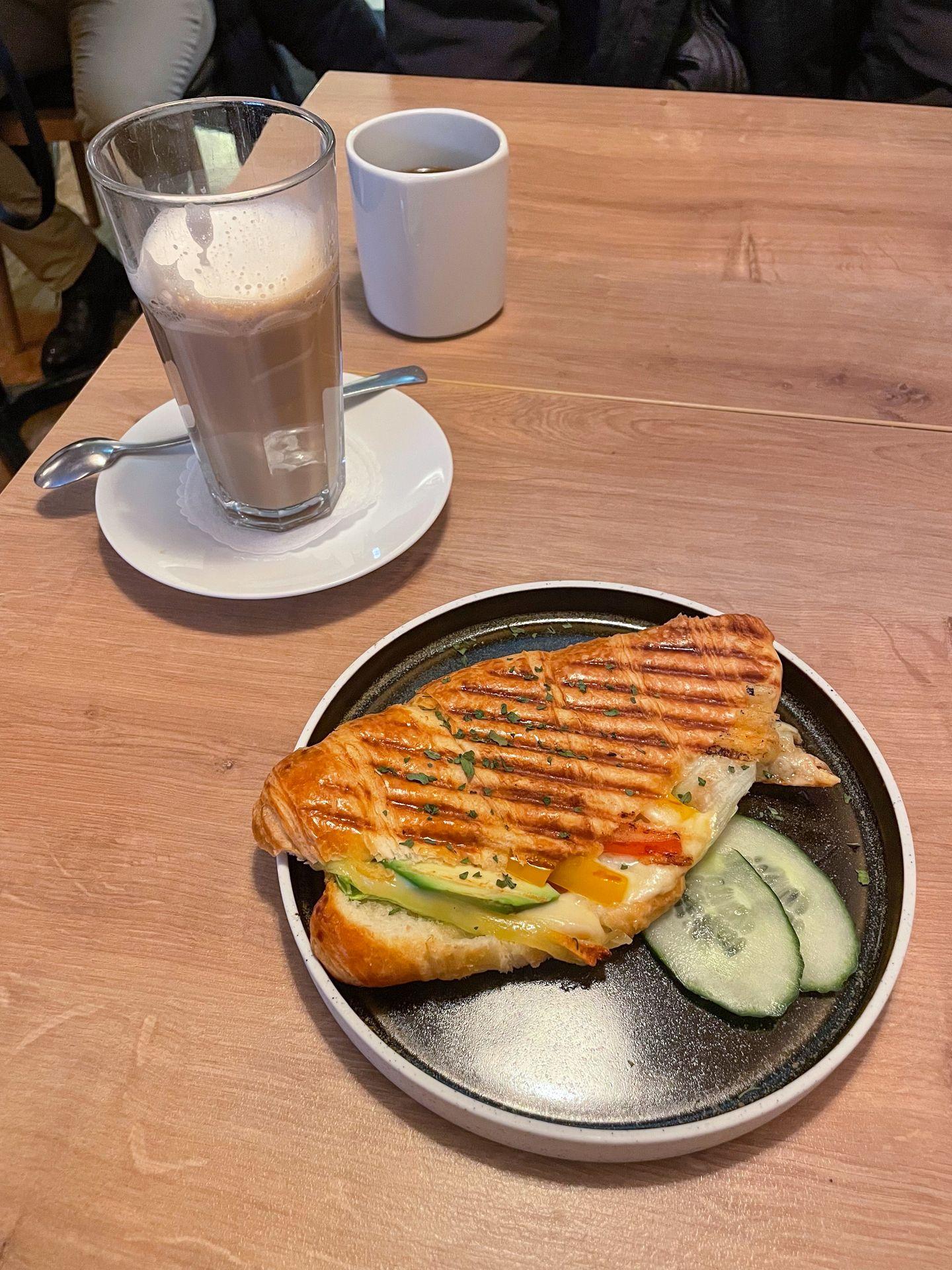 A panini and a coffee from Koseverden & Koselig Cafe