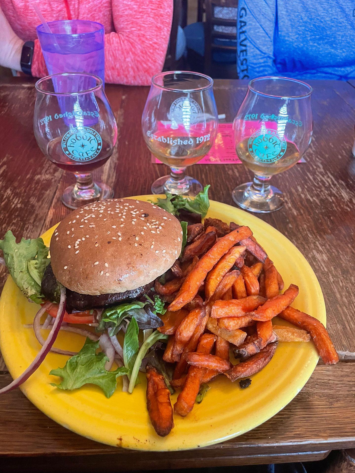 A mushroom burger and sweet potato fries from Hobbit Cafe