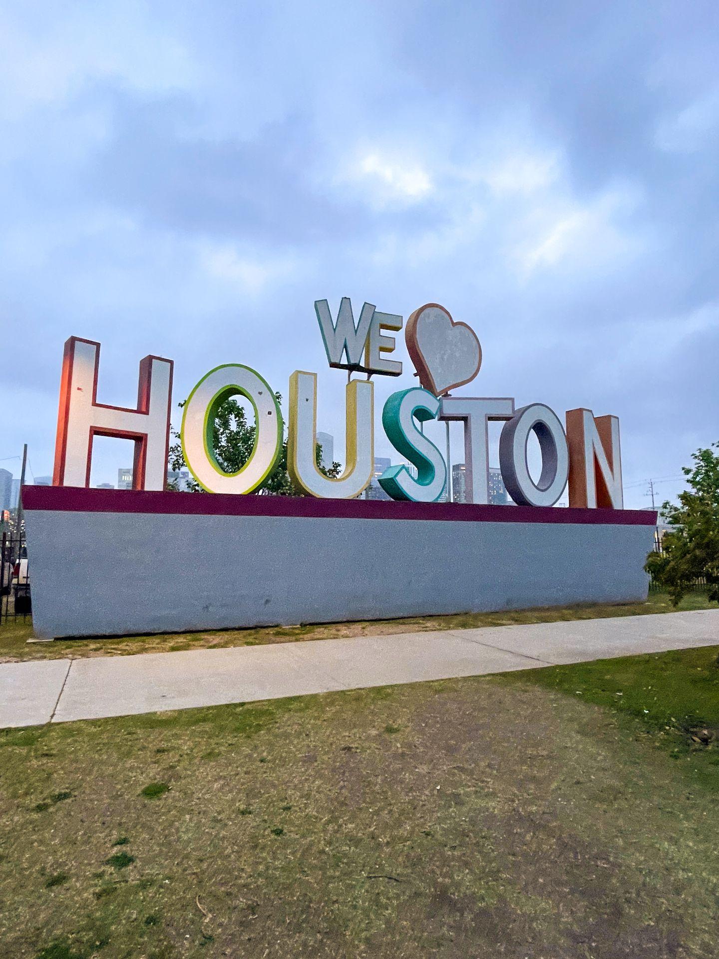 A colorful sculpture that reads 'We Heart Houston'