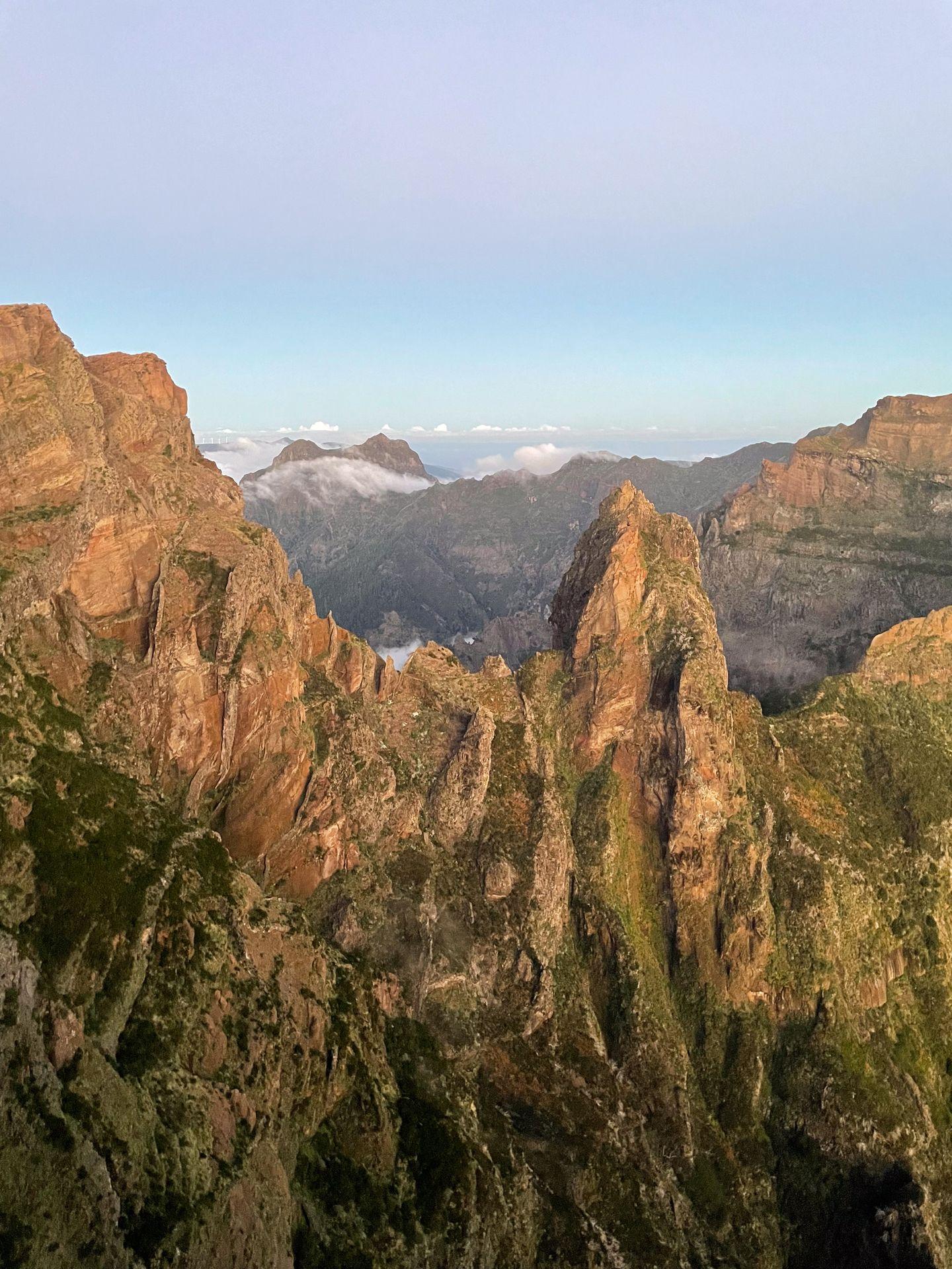 A view of jagged mountain peaks from the PR1 trail in Madeira.