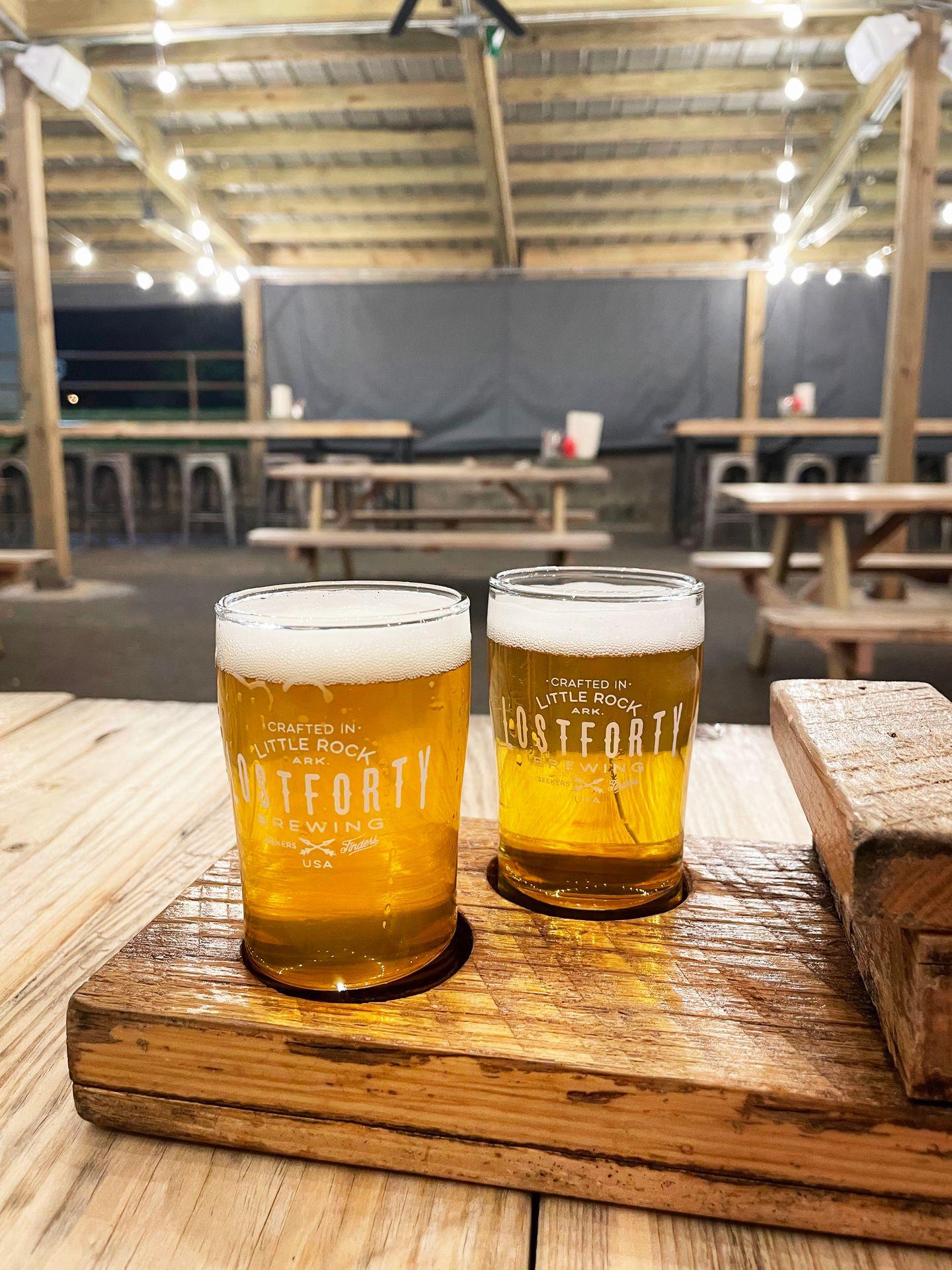 Two small glasses of light beer in a flight at Lost Forty Brewery