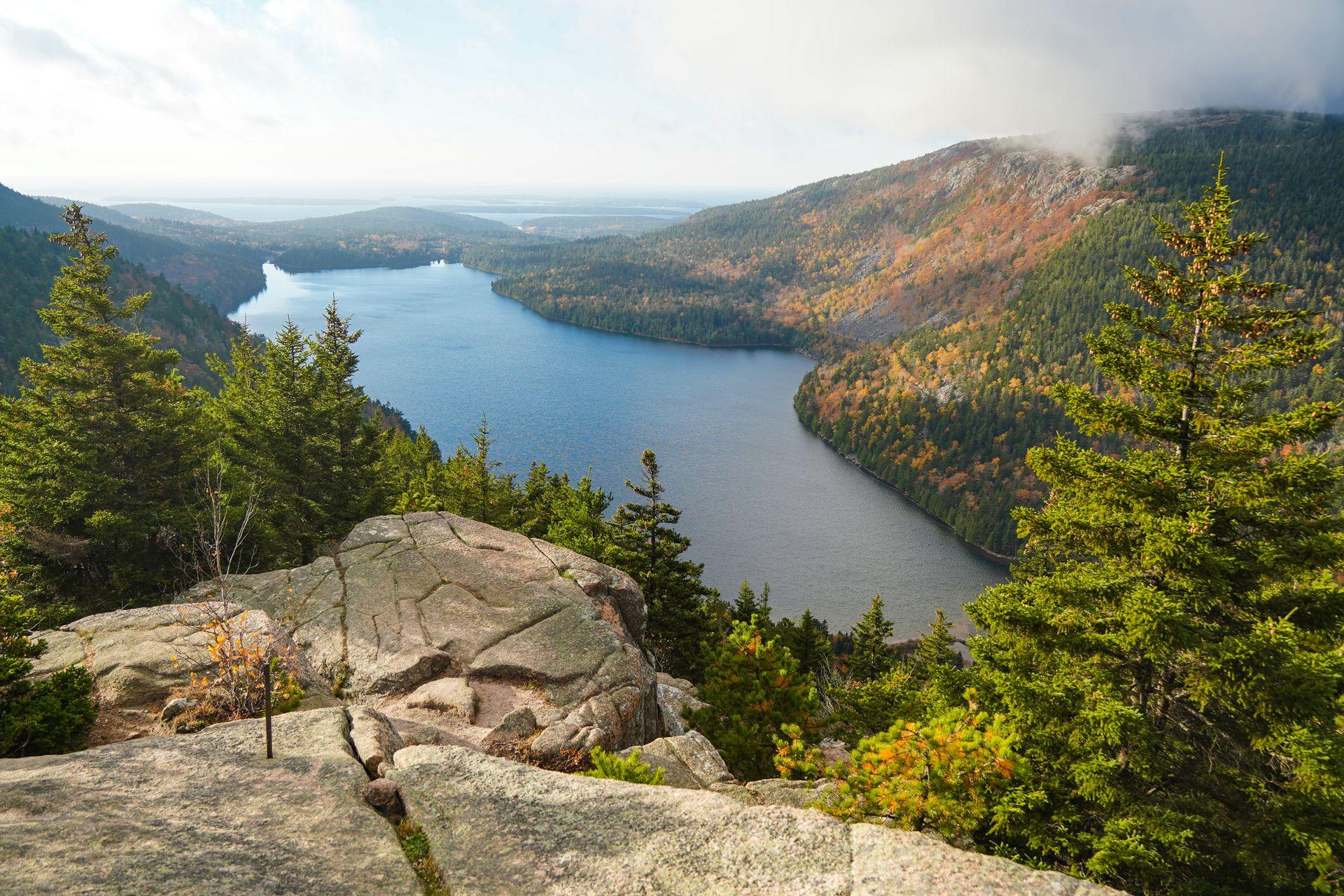 A view of a lake from the top of North Bubble.