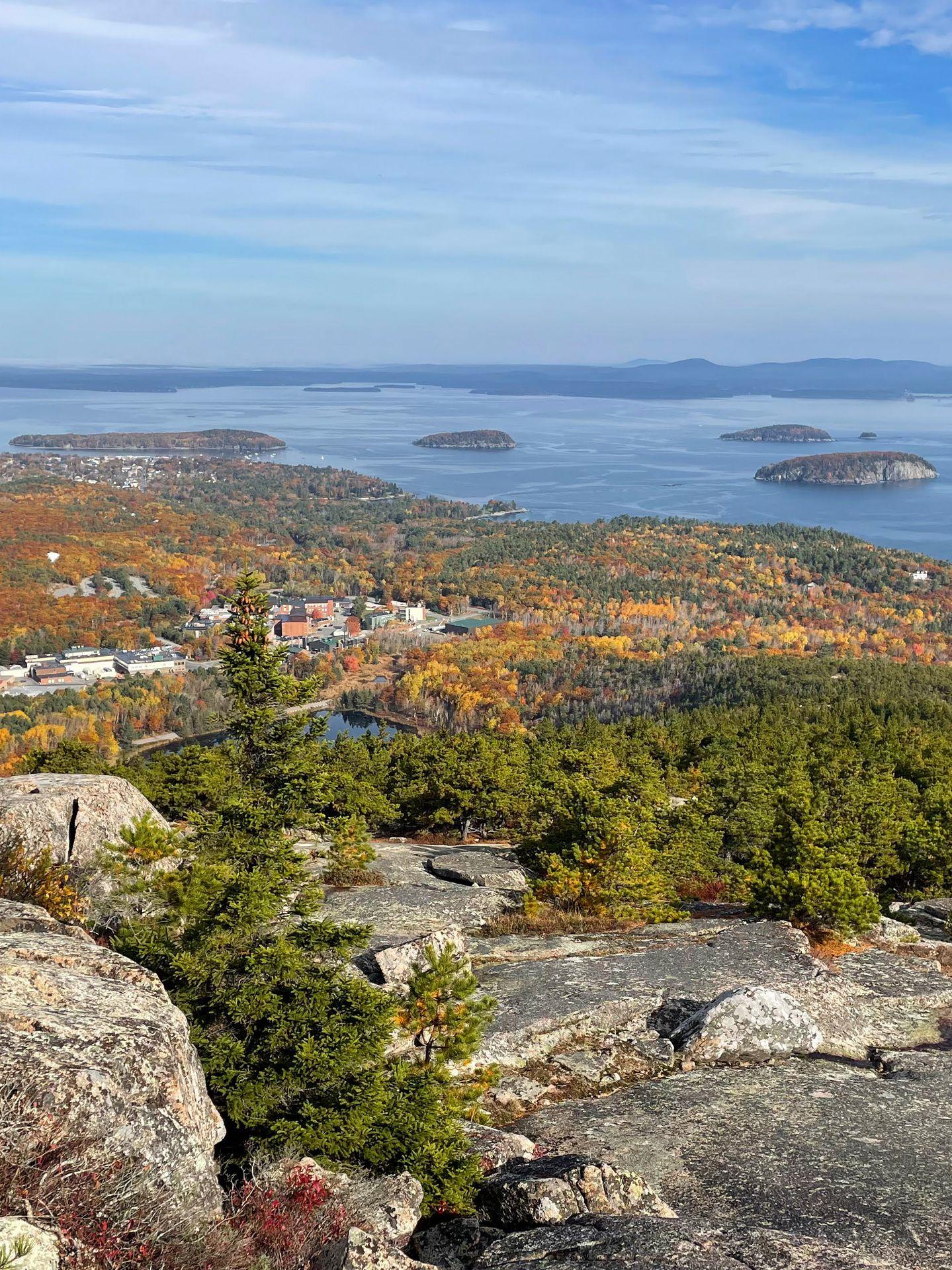 Looking out at the water and fall foliage from the Precipice Trail
