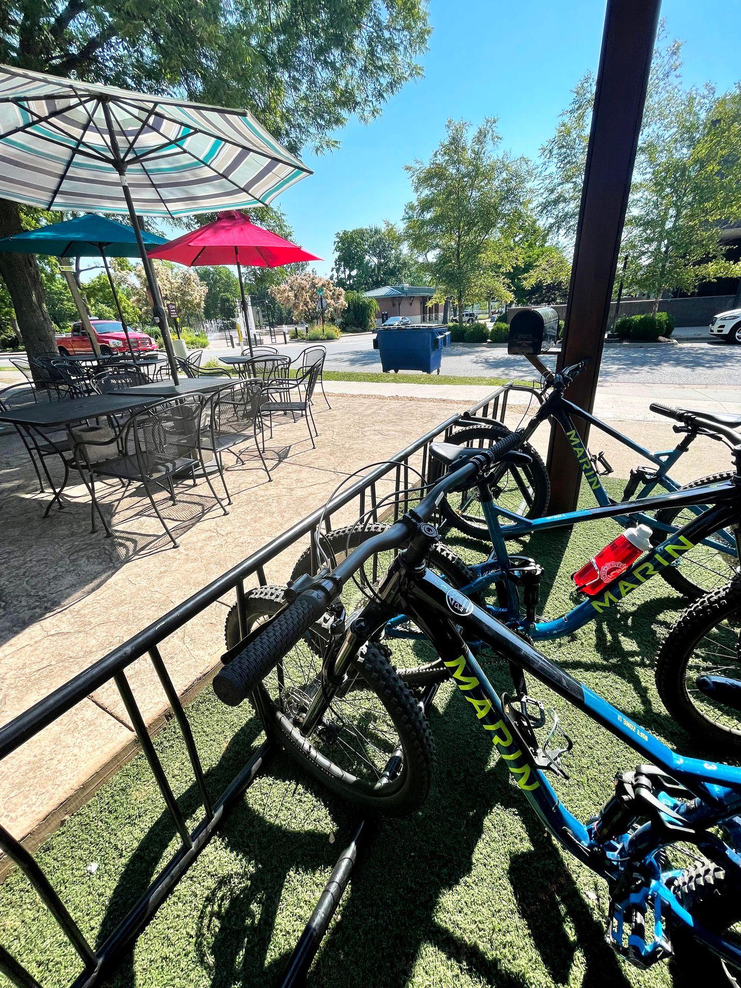 A few bikes on a rack outside of Spoke Adventures.