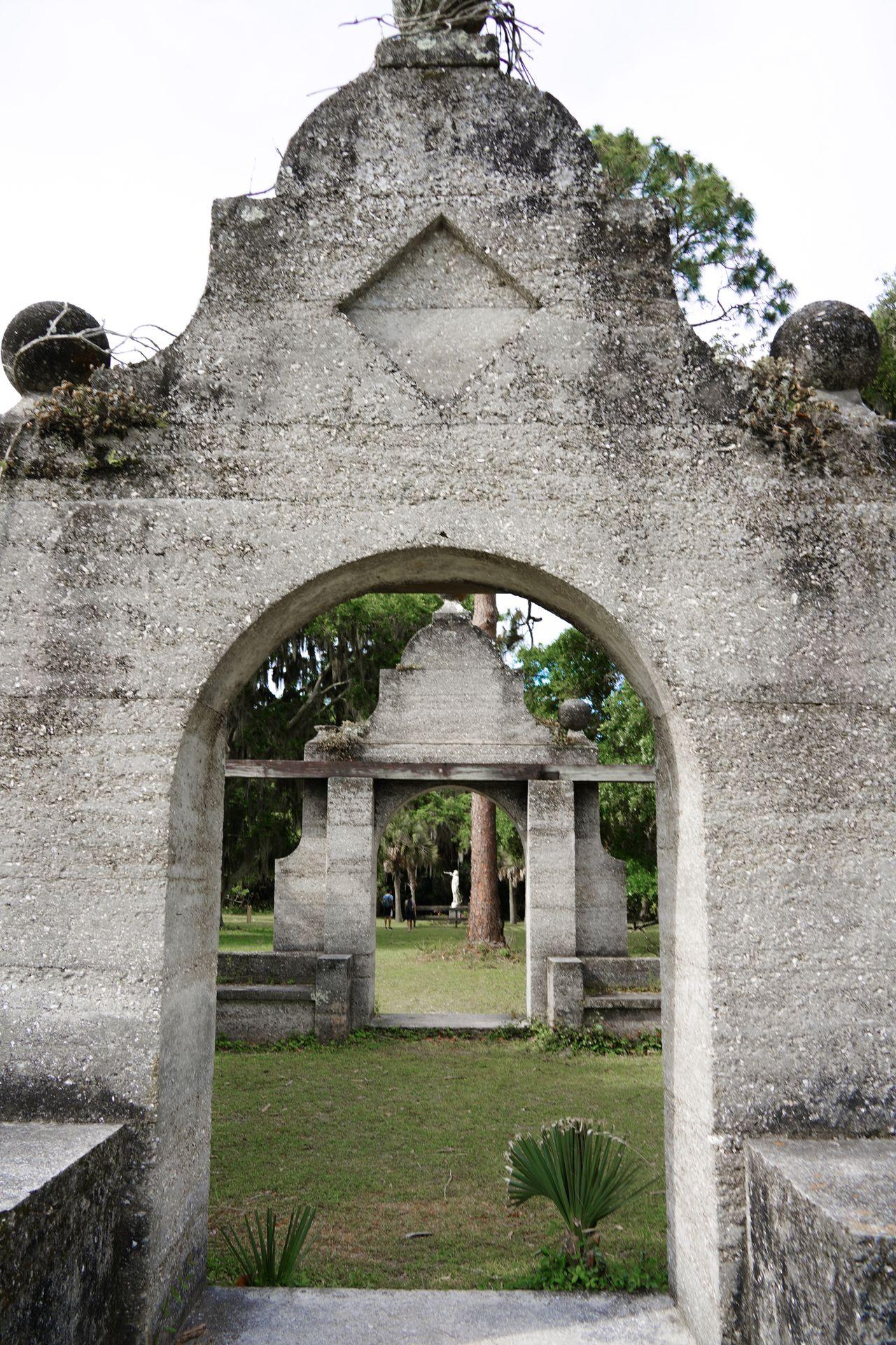 Looking through an arch at ruins of the Dungeness Mansion on Cumberland Island