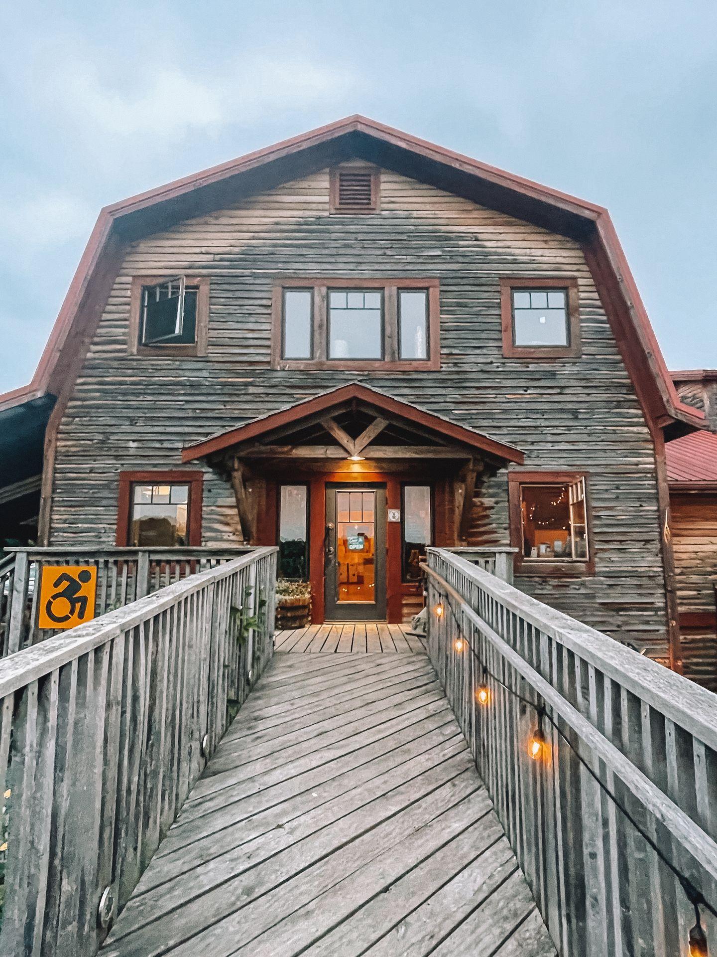 A path leading up to a barnhouse at Finger Lakes Cider House.