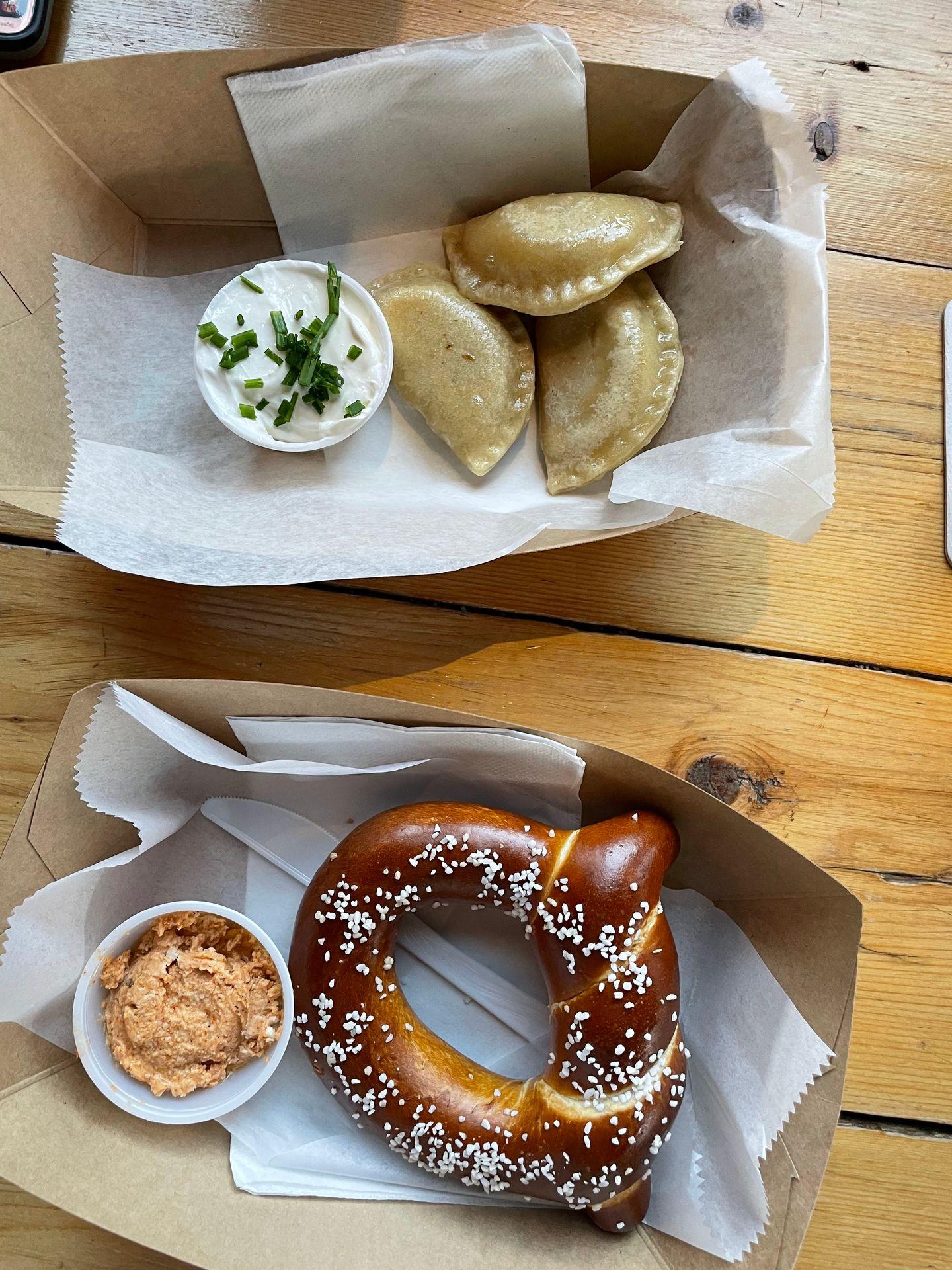 A soft pretzel and pierogies from Notch Brewing