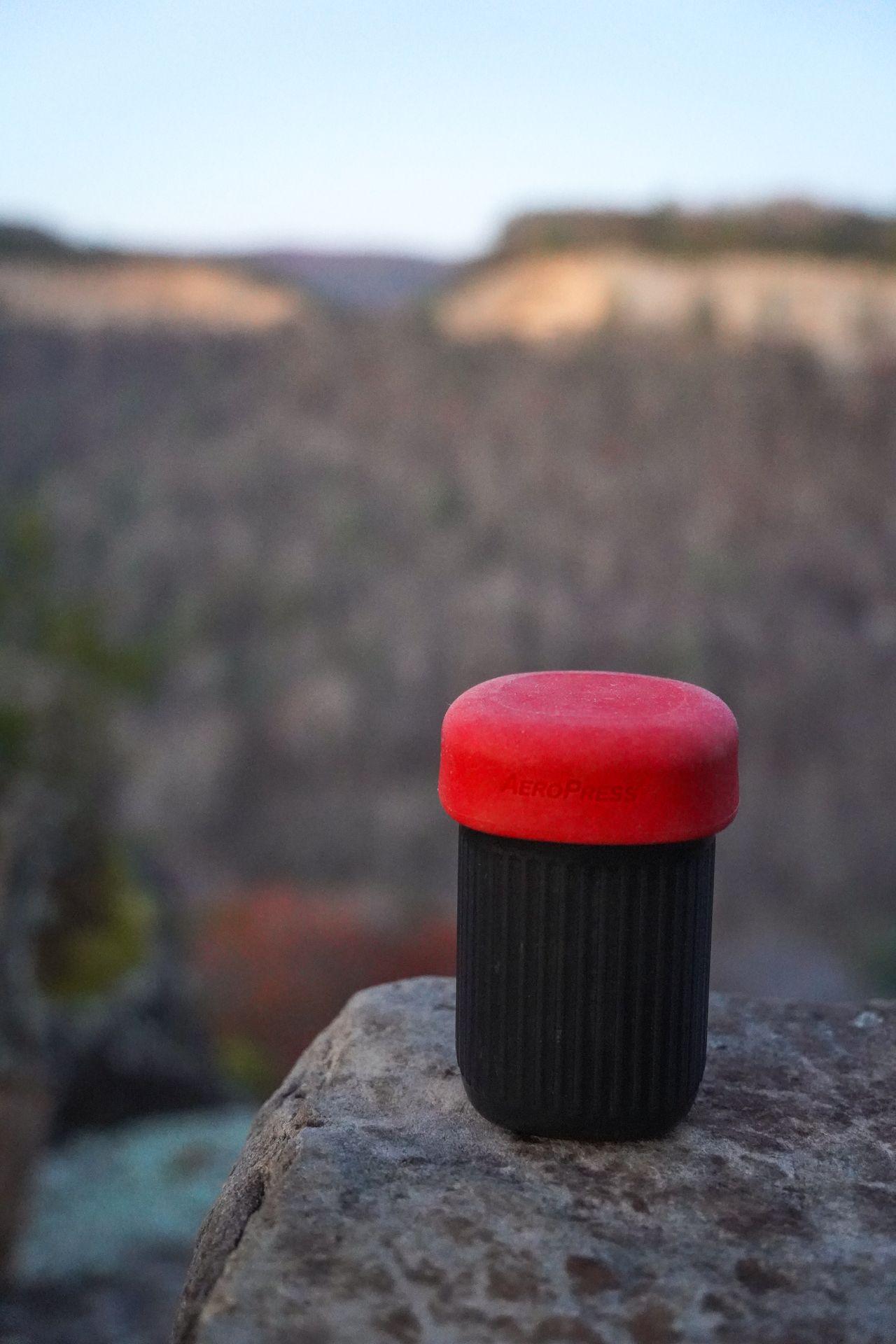 An Aeropress sitting outside.