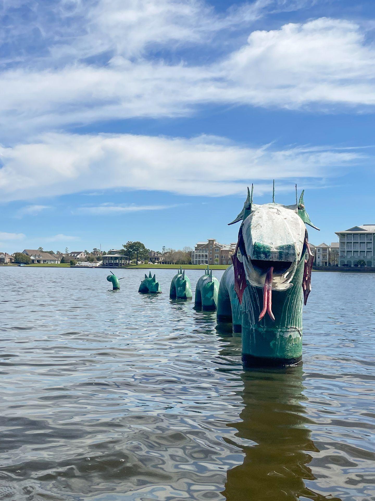 Looking directly at a the dragon statue in Lake Woodlands