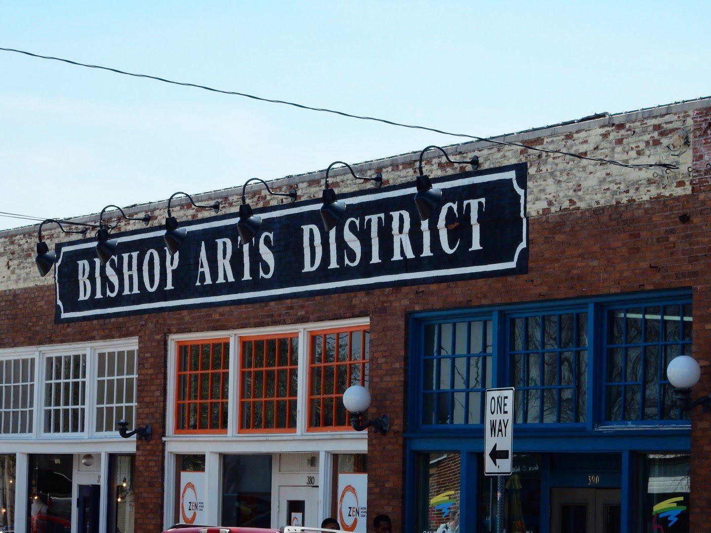 A vintage-looking building with a sign for "Bishop Arts District"
