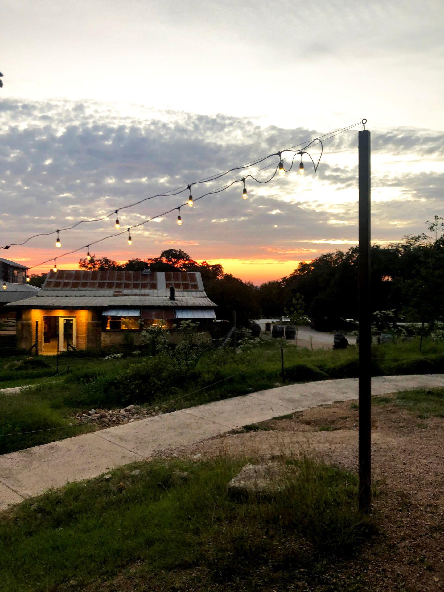 The sun setting over the Jester King Brewery.