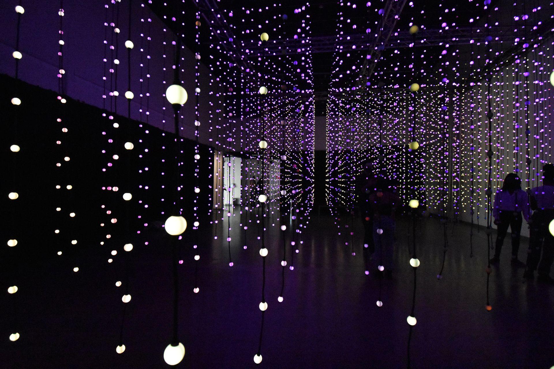 A room full of hanging lights at Wonderspaces.