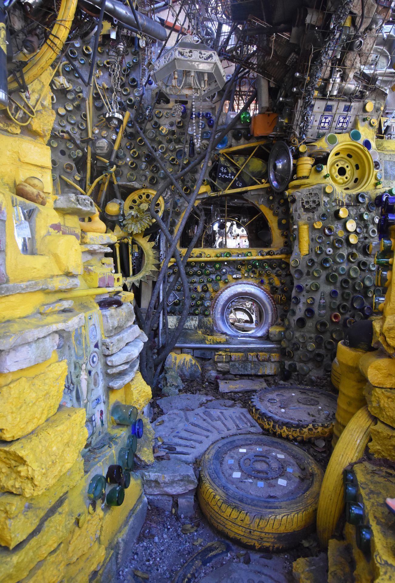 A room of mostly yellow objects at the Cathedral of Junk.