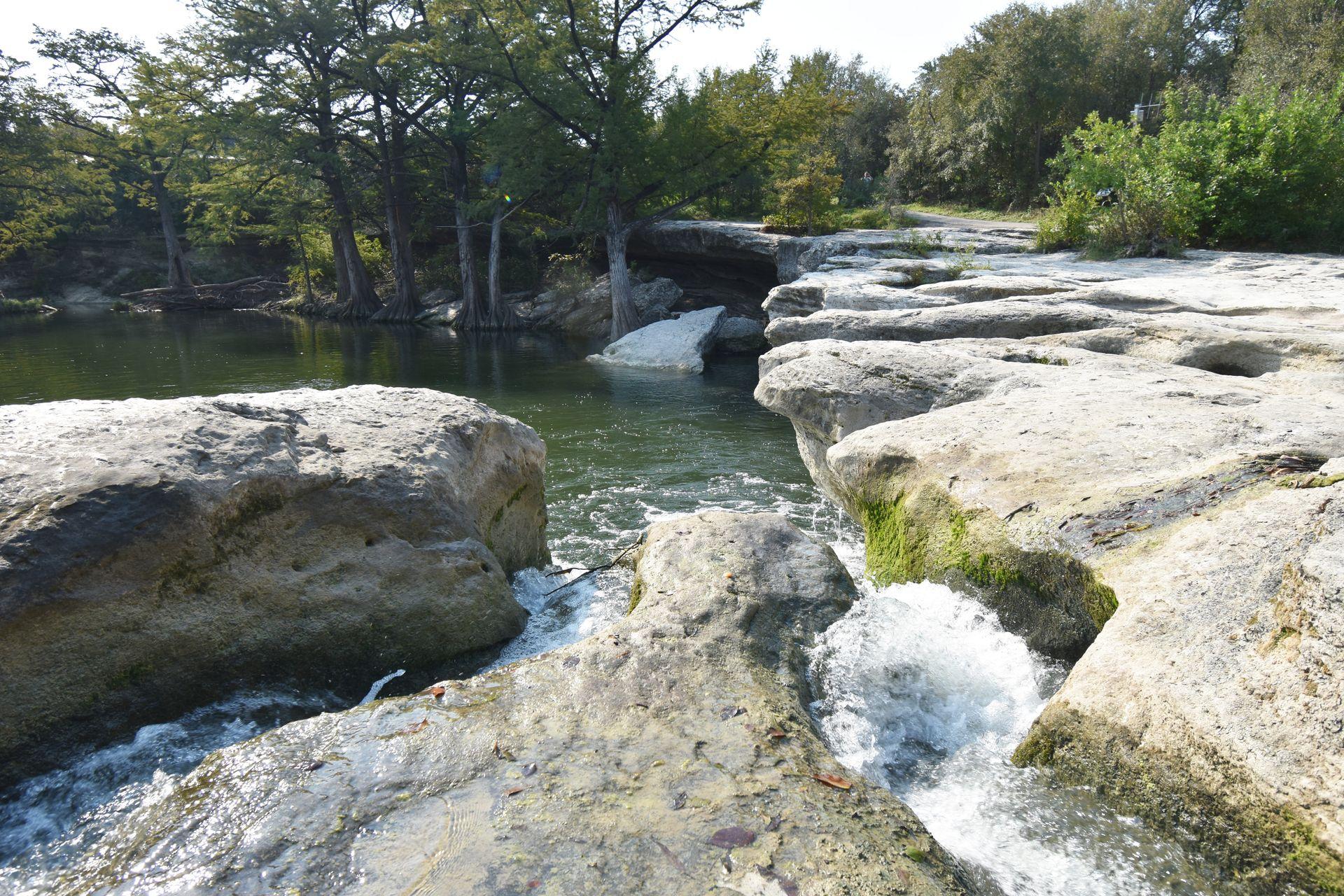 Standing from the rocks at Upper Falls in McKinney Falls State Park
