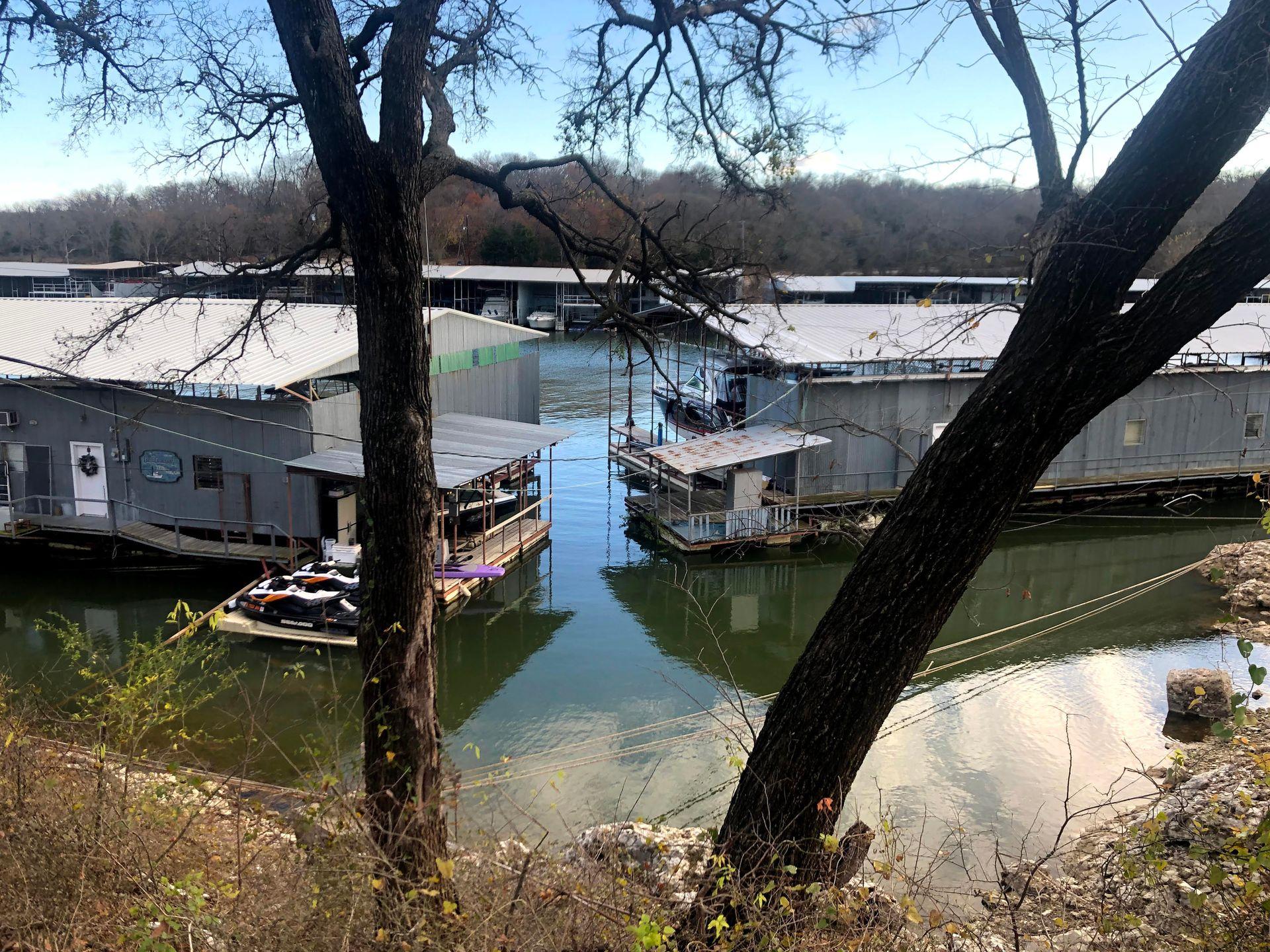 Some floating houses and boats at the dock at Eisenhower Yacht Club.
