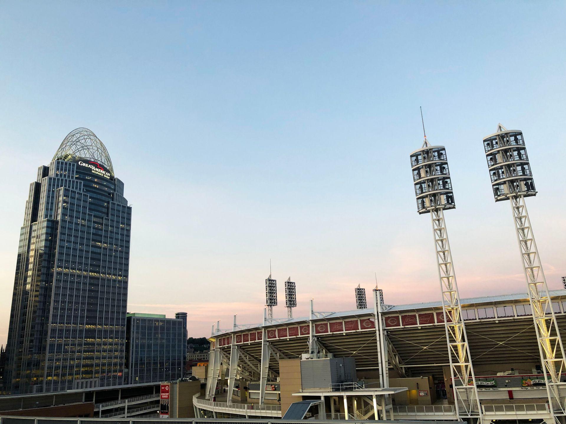 Standing outside the Great American Ballpark. The ballpark is on the right and you can see the Great American Tower on the left.