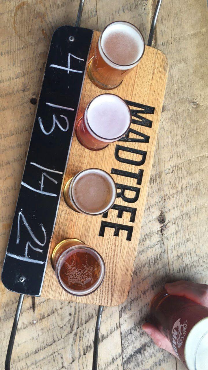 Looking down at a flight of beer from Madtree.