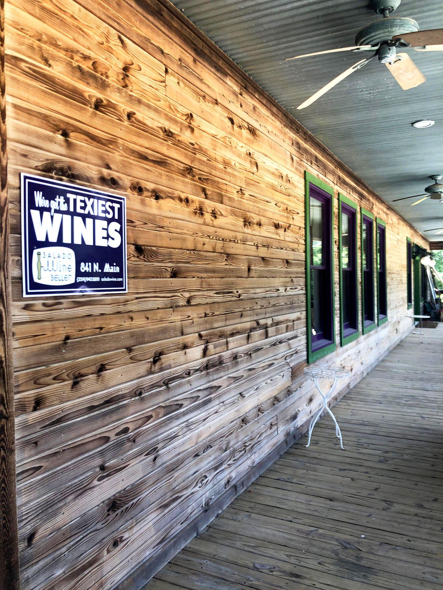 The wood exterior of Salado Winery from their porch.