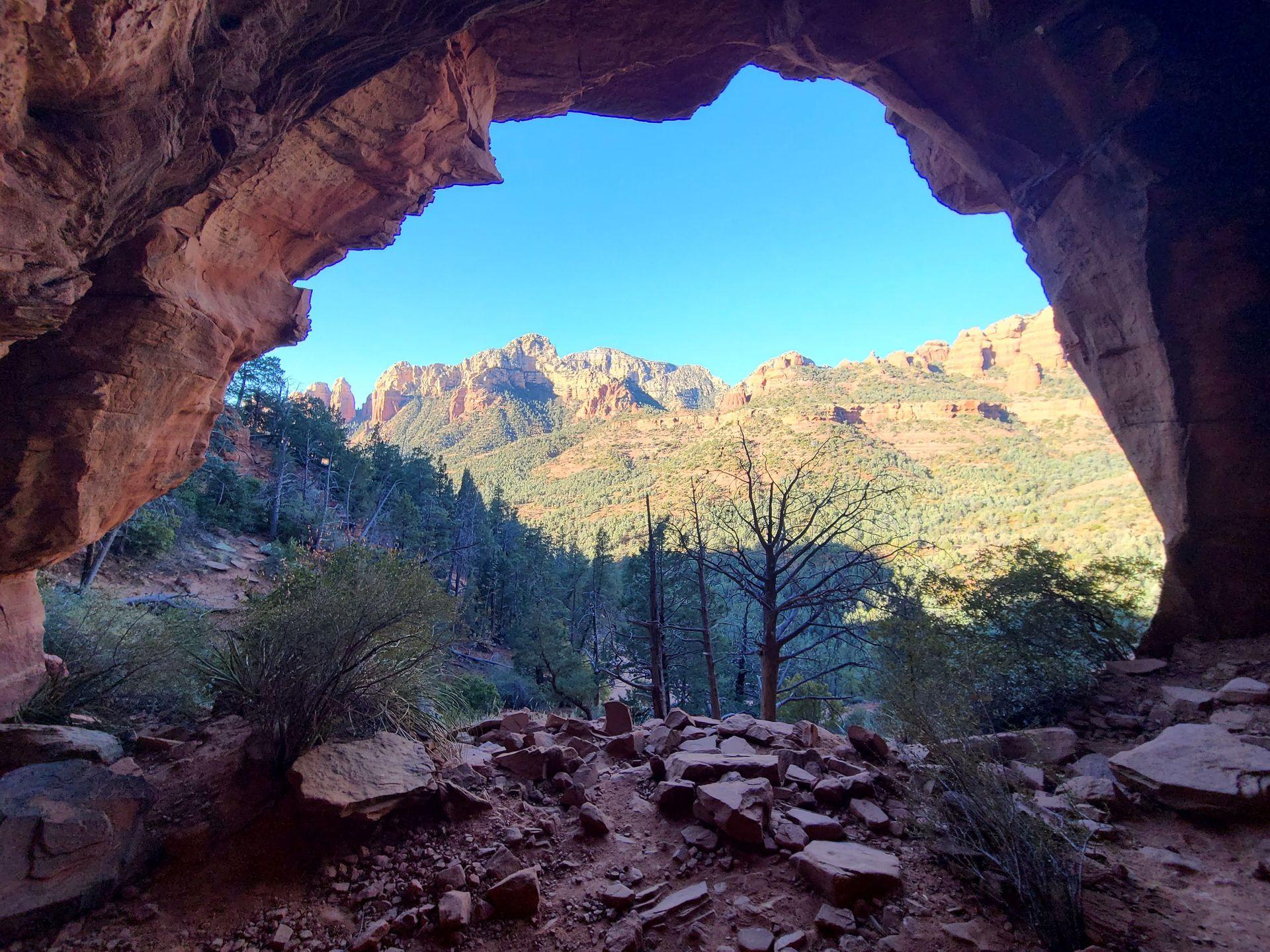 Looking out from an orange rock cave on the Soldier's Pass trail