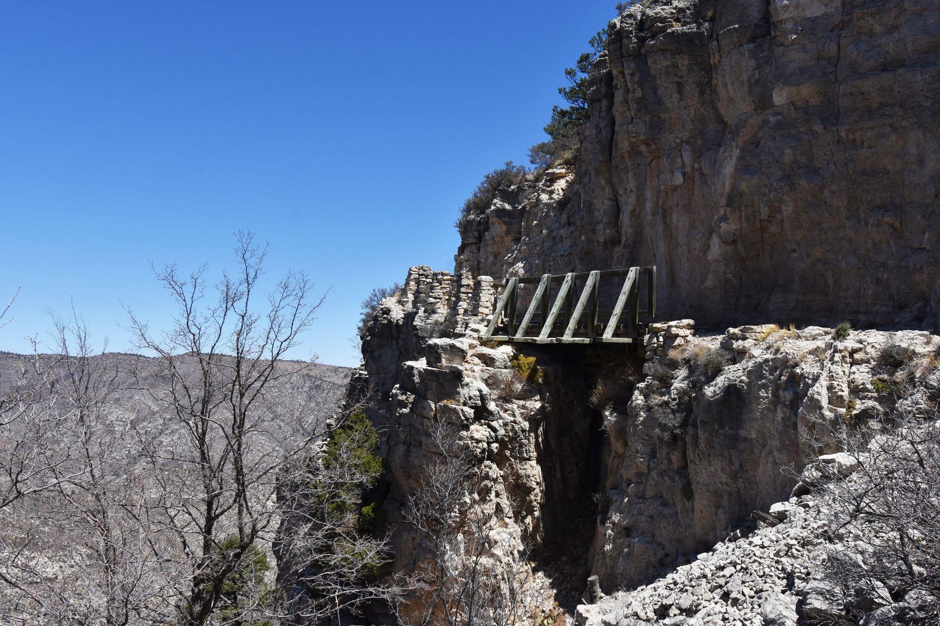 A bridge on the side of the mountain on the Guadalupe Peak trail.