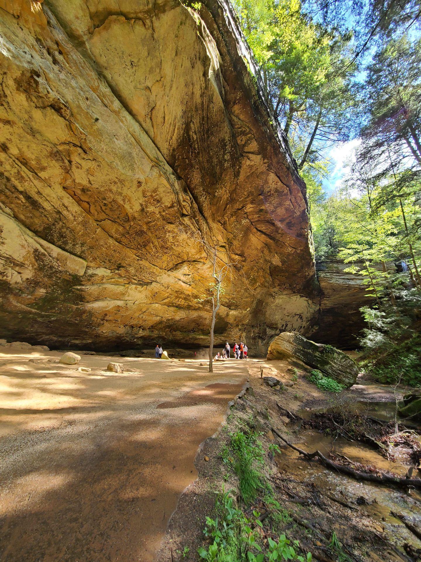 A large rock face and overhang area of the Old Man's Cave.