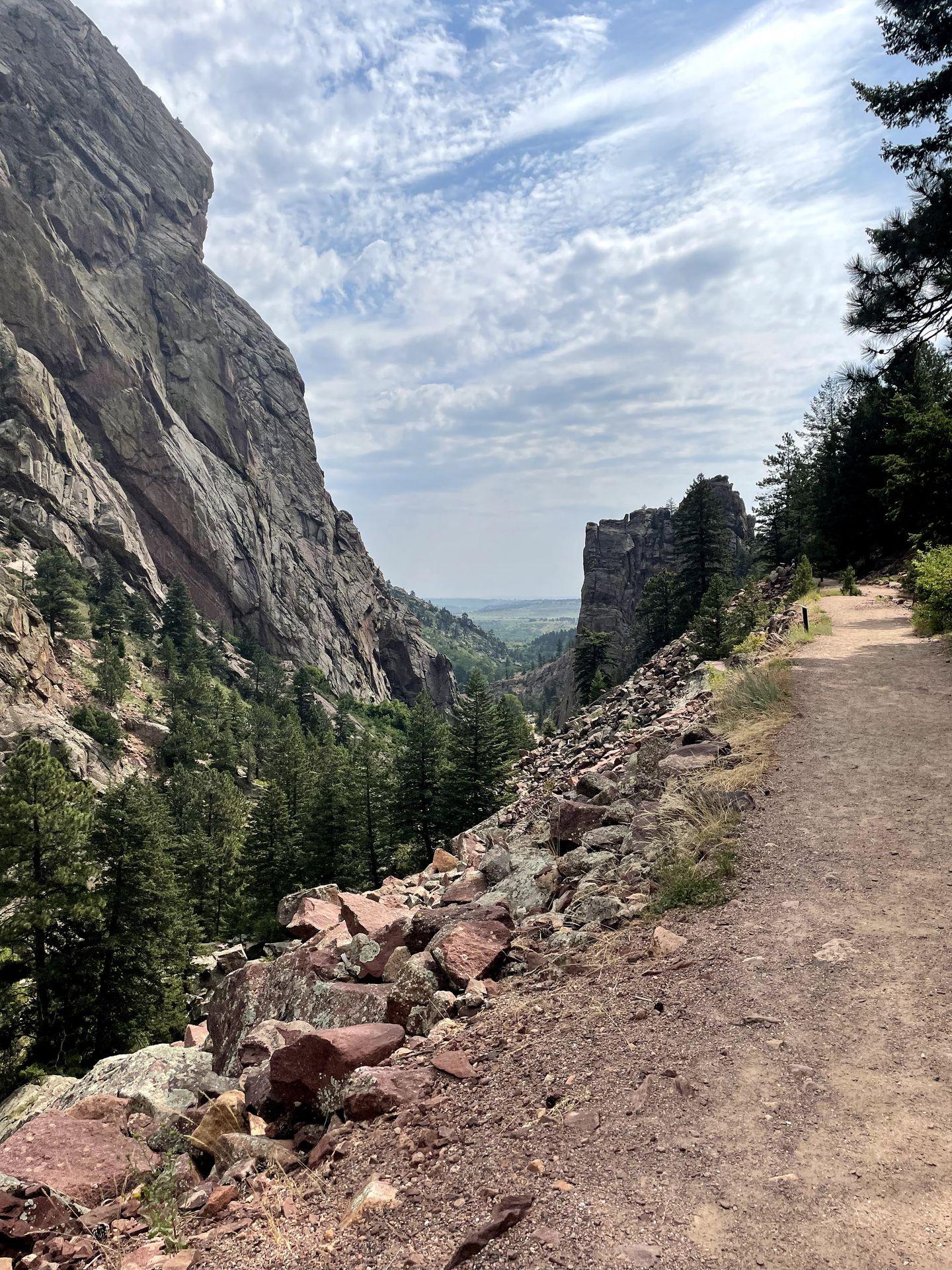 A trail with a view of rocks in the distance at Eldorado Canyon State Park