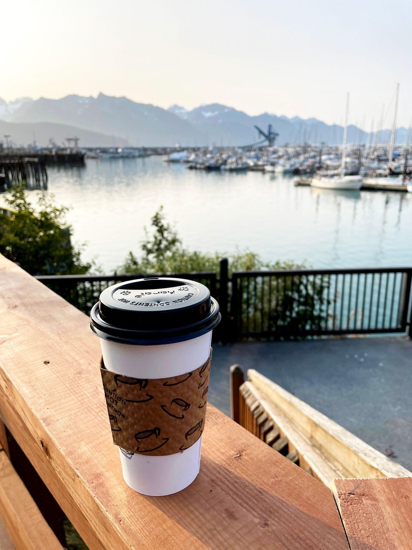 A coffee with a view of Seward Harbor behind it.