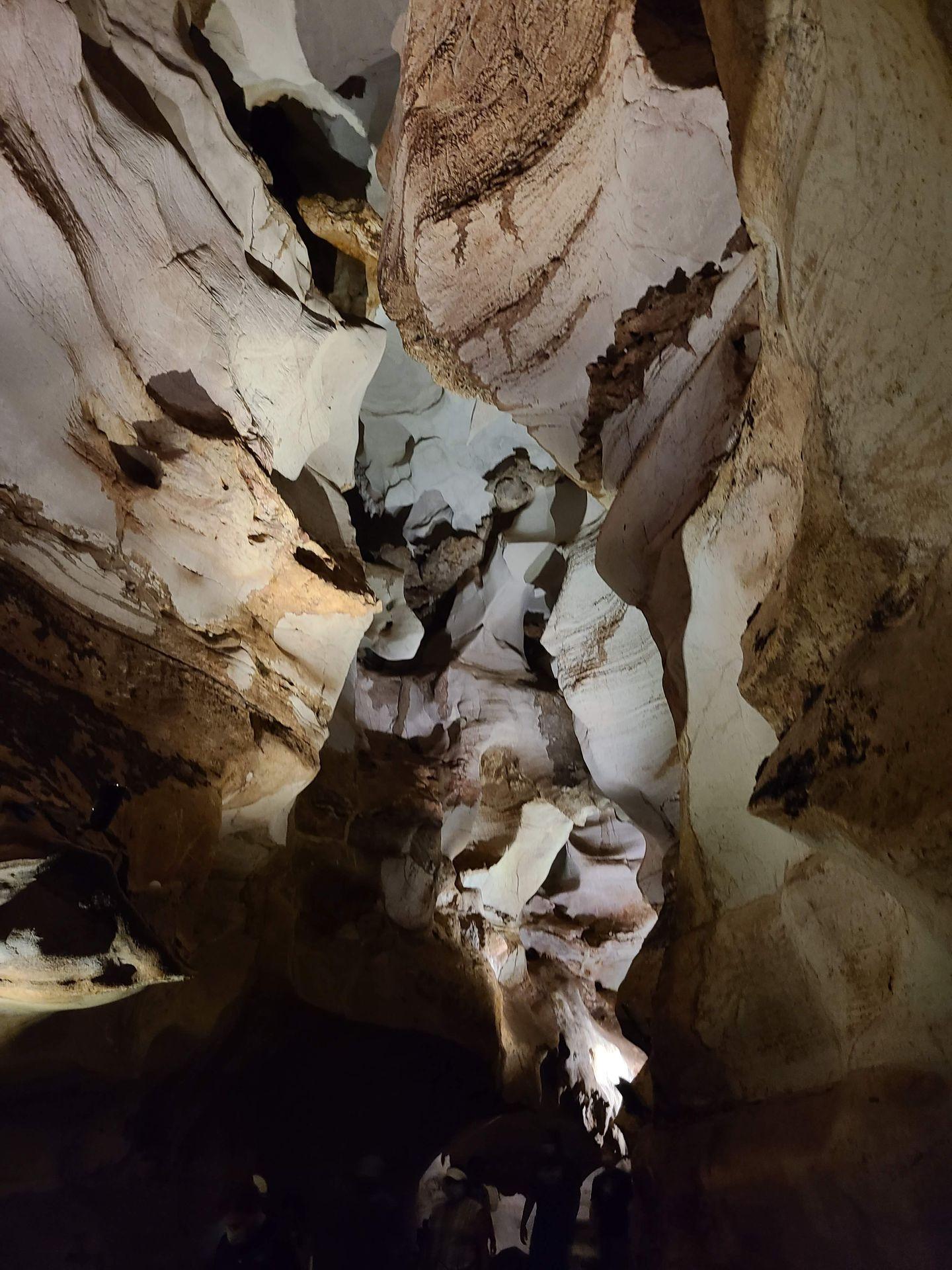A view looking up at the walls inside of Longhorn Caverns.