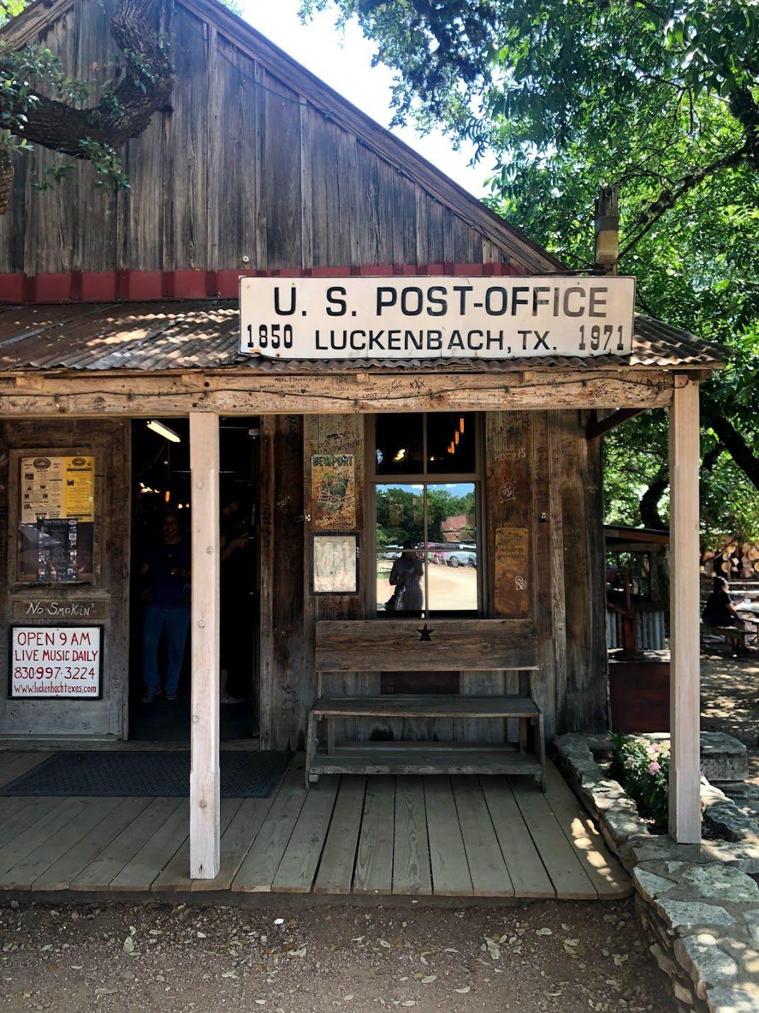 The Luckenbach post office, a wooden building with a sign that reads 1850 - 1971