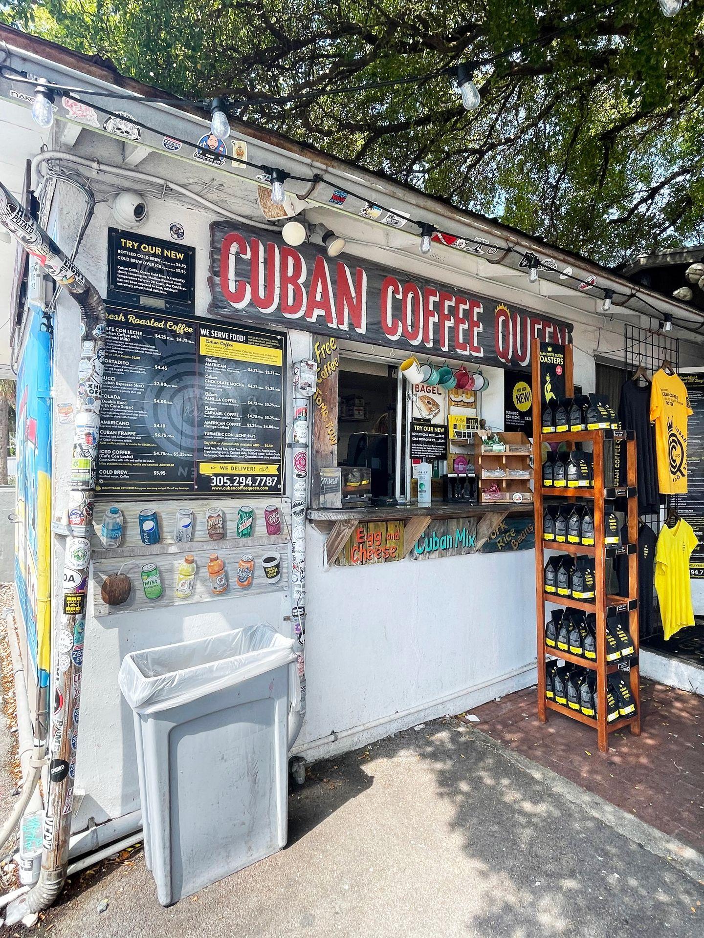 The order window at Cuban Coffee Queen. There is a menu on the left side of the window and ground coffee on the right