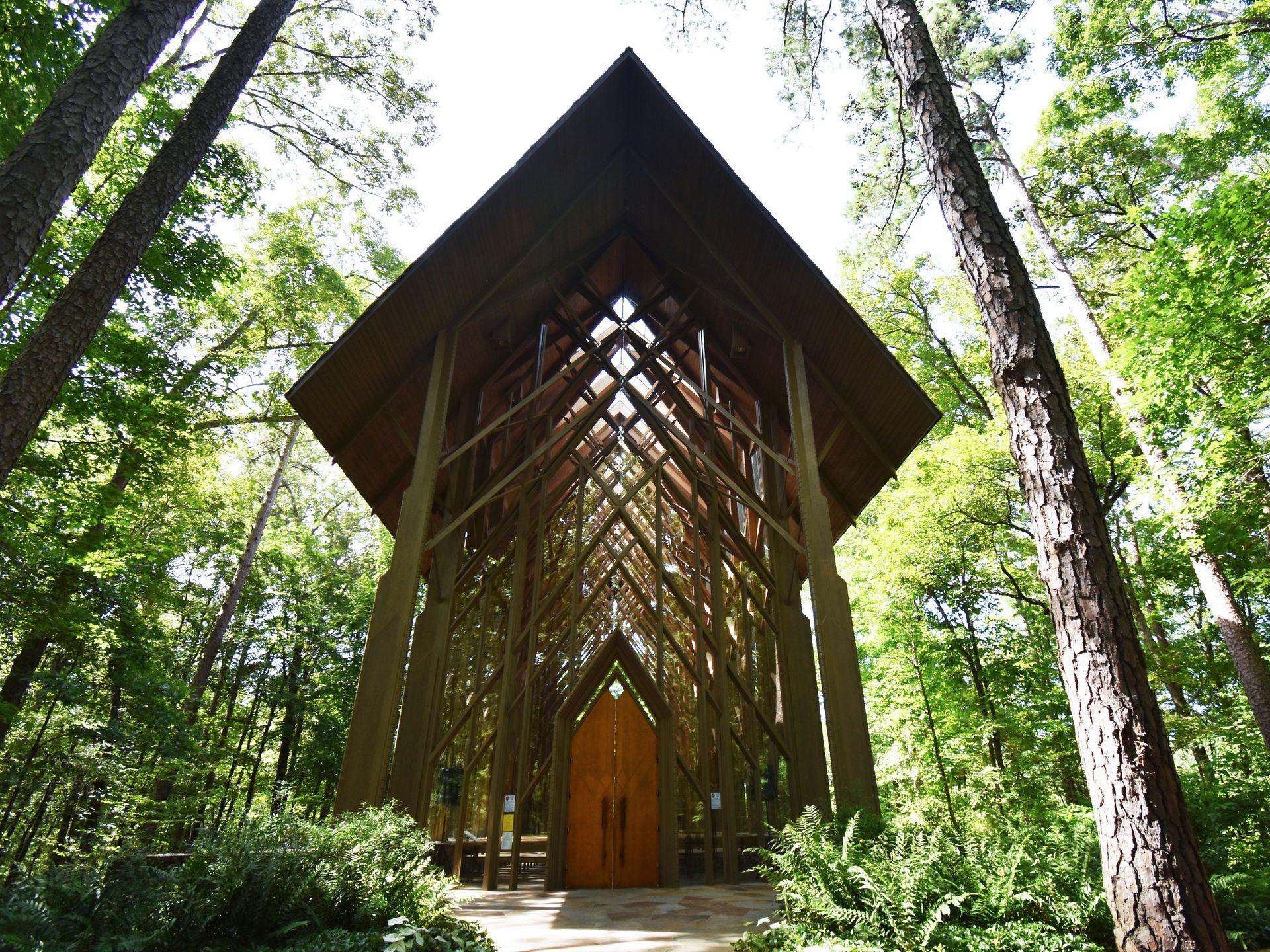 A glass church in the forest at Garvan Woodland Gardens.