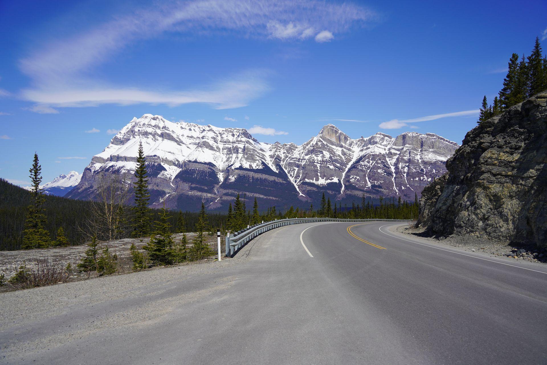 Large, towering mountains seen along The Icefields Parkway.