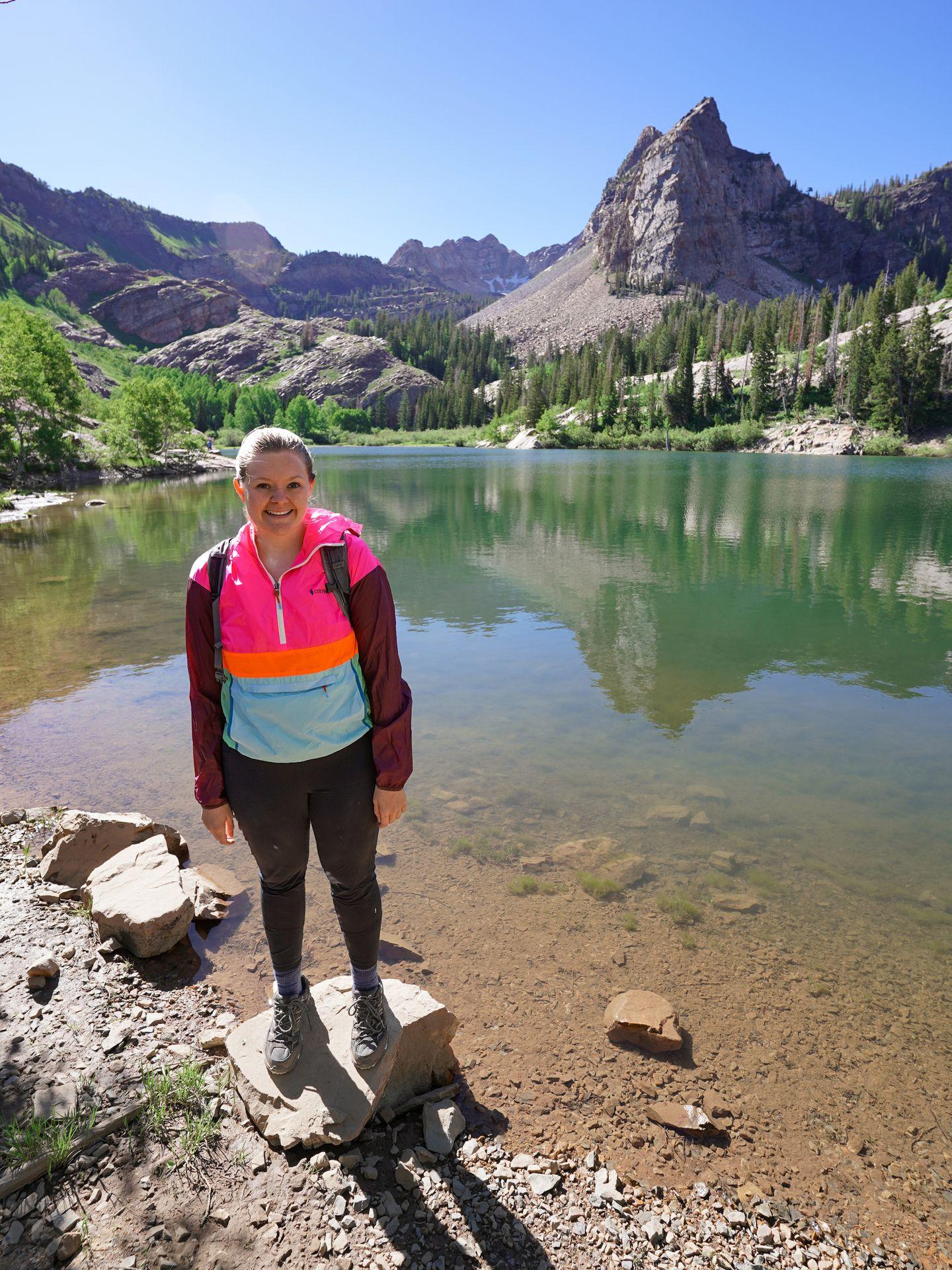 Lydia standing in front of Lake Blanche.