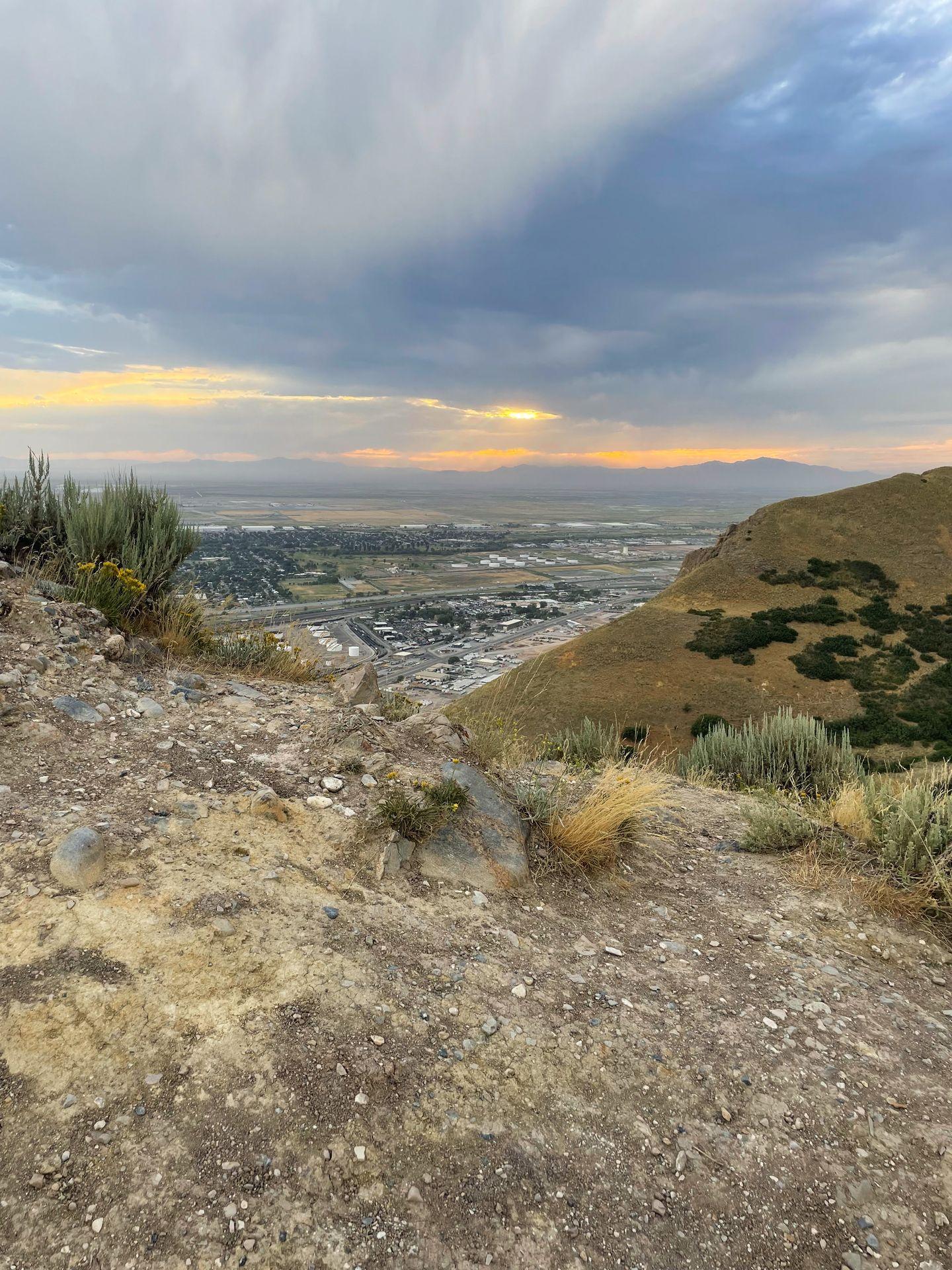 A view looking down at the city from Ensign Peak at sunset.