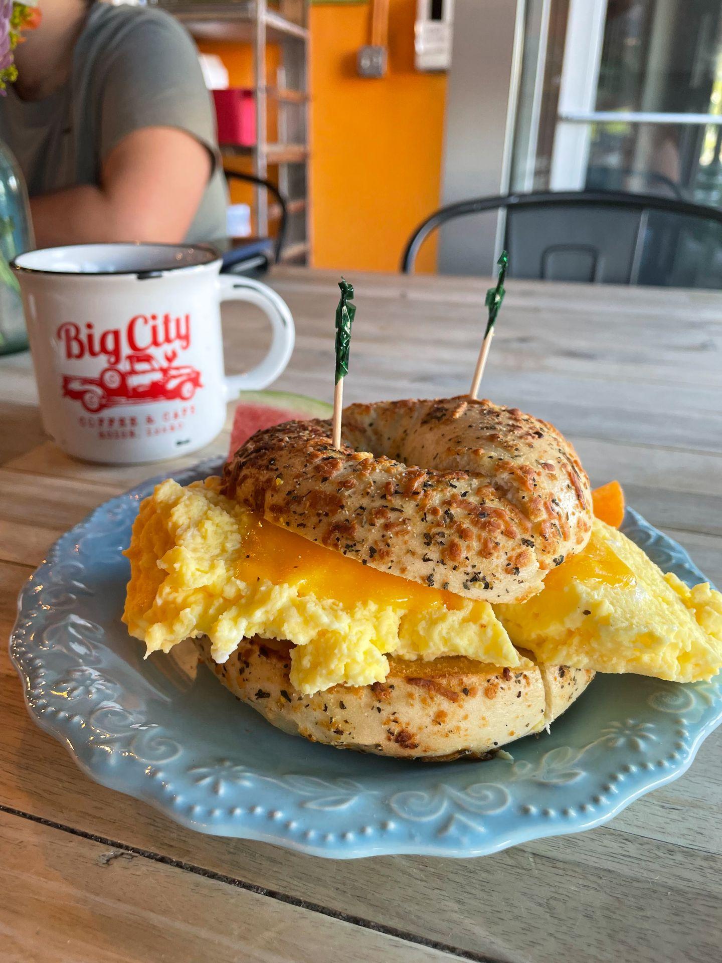 A bagel sandwich with fluffy steamed eggs and cheese from Big City Coffee.