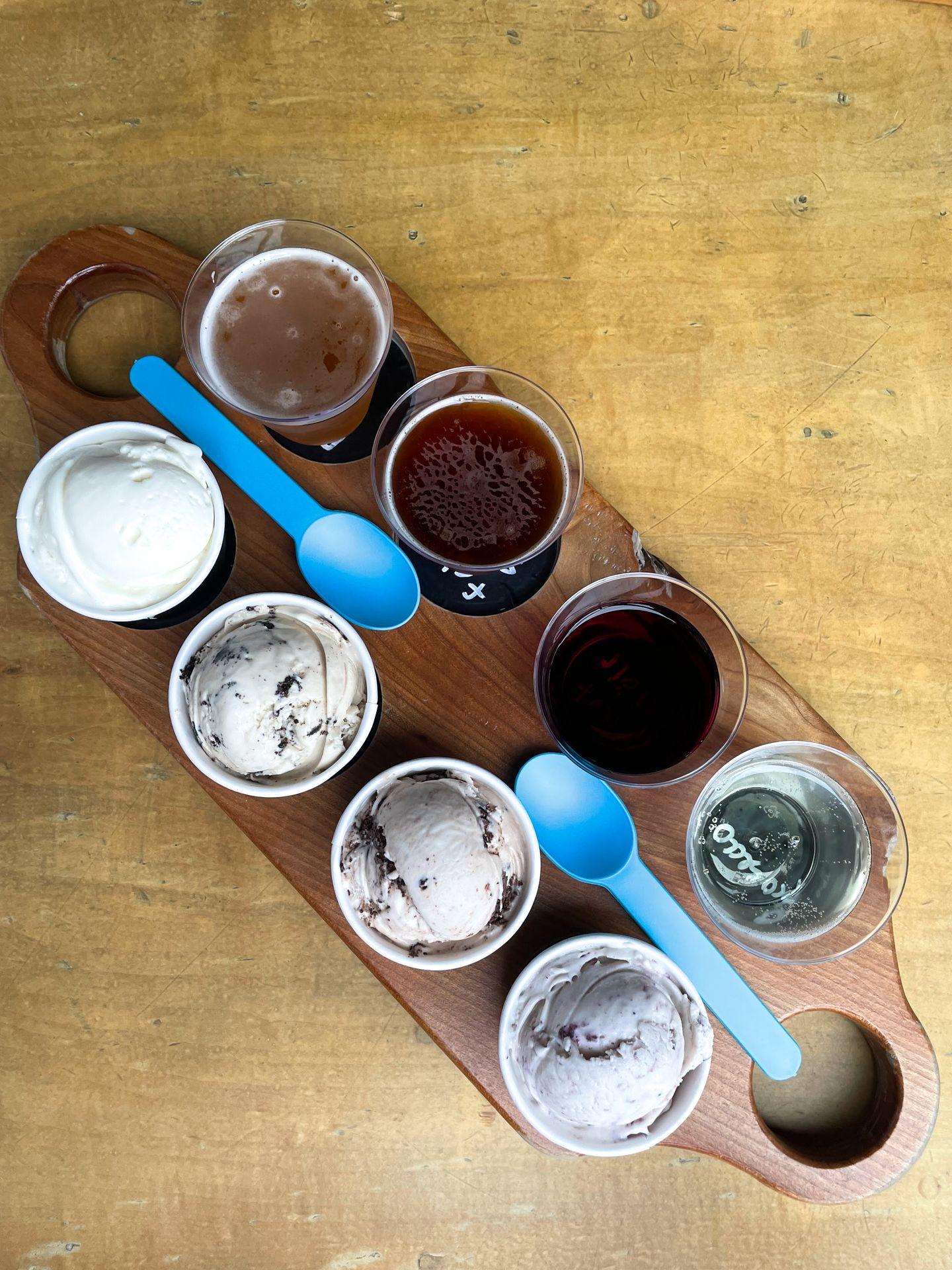 Looking straight down at a flight of beer, wine and ice cream from The Stil.