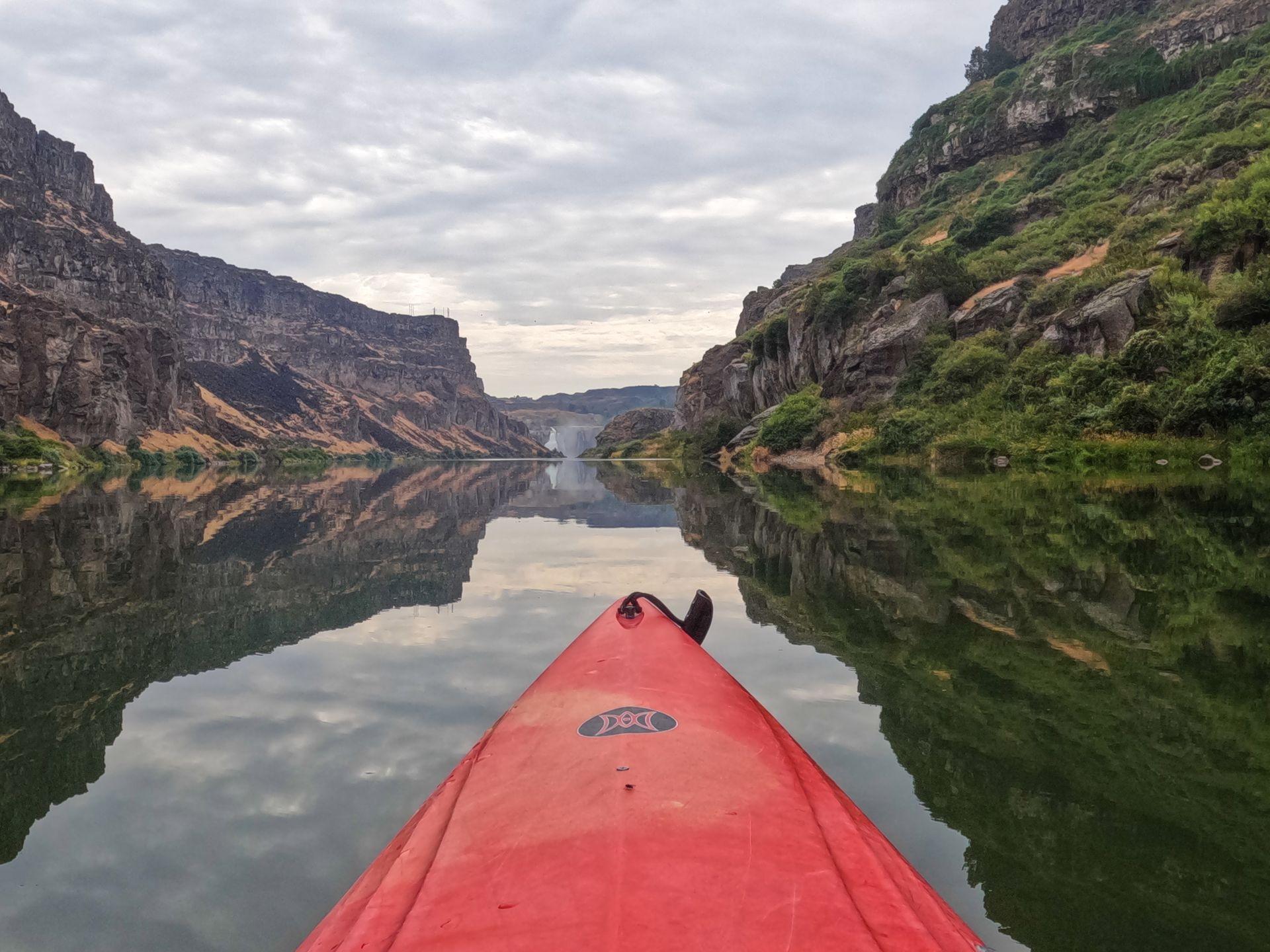 Looking out at Shoshone Falls in the distance while kayaking on the Snake River.