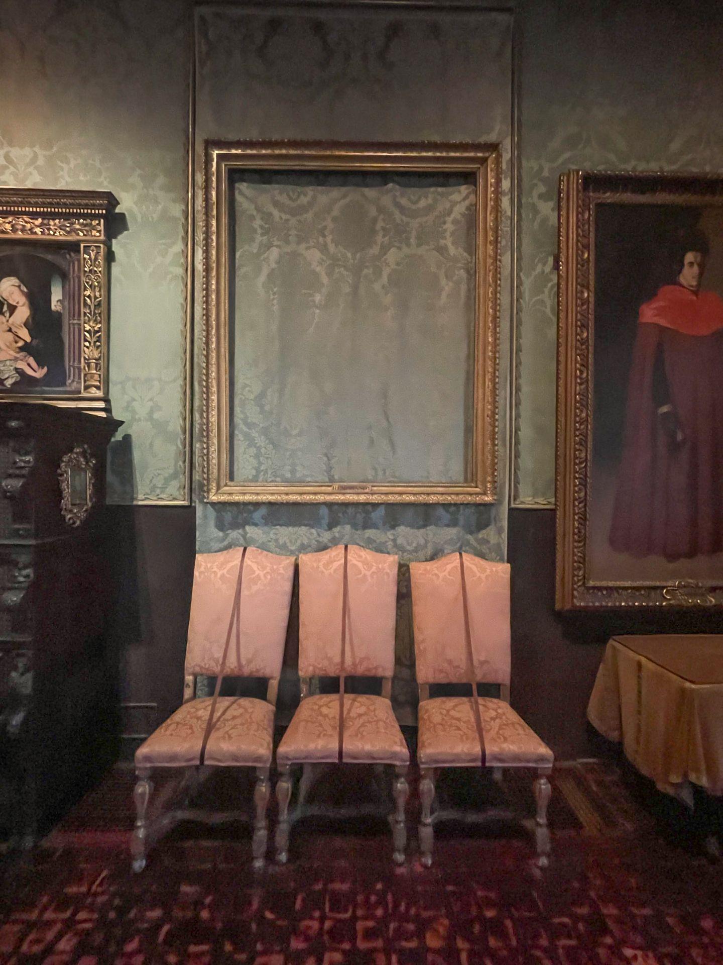 An empty frame indicating a stolen painting in the Isabella Gardner Museum