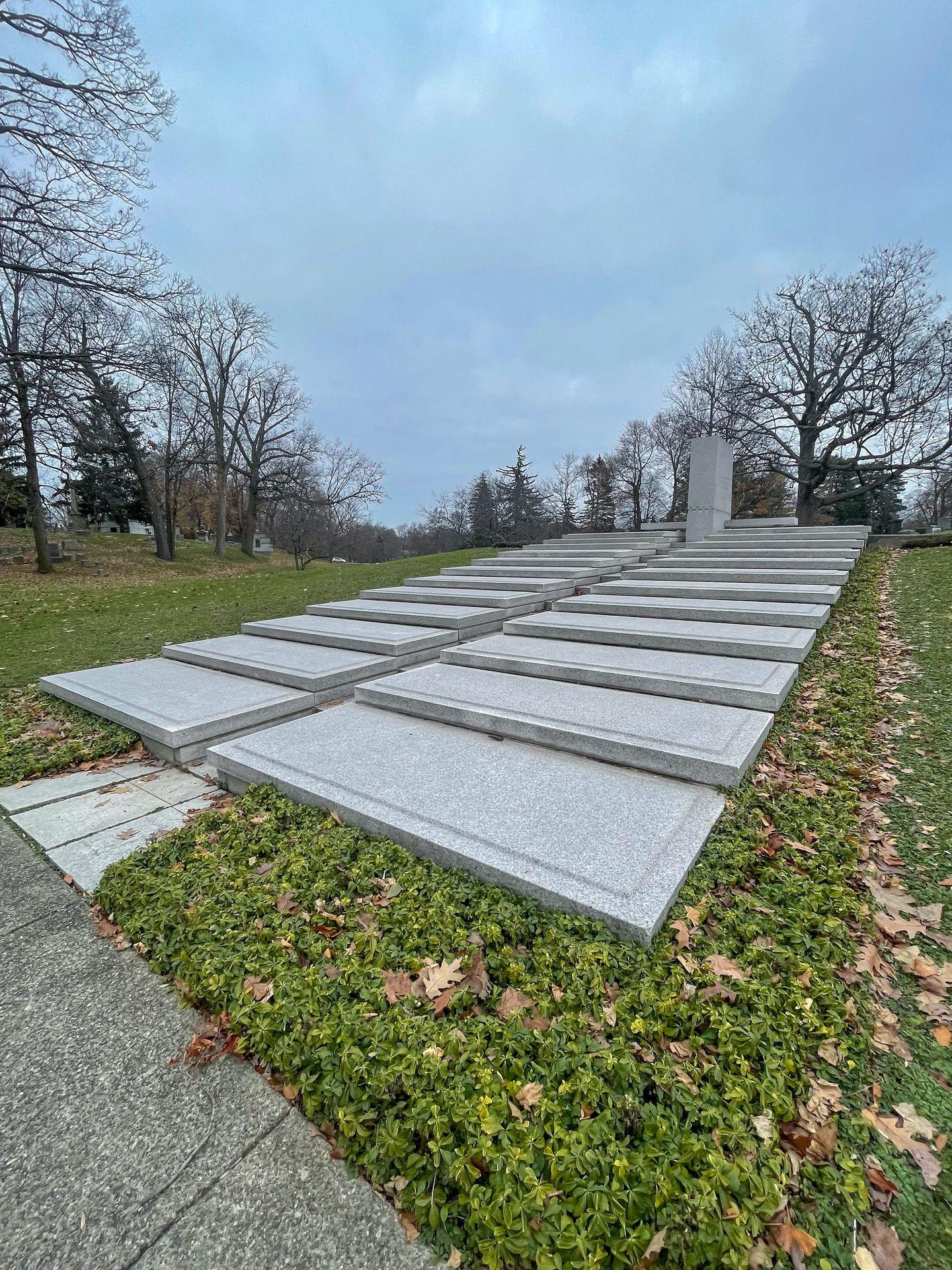 An open air mausoleum designed by Frank Lloyd Wright. The mausoleum looks a bit like steps.