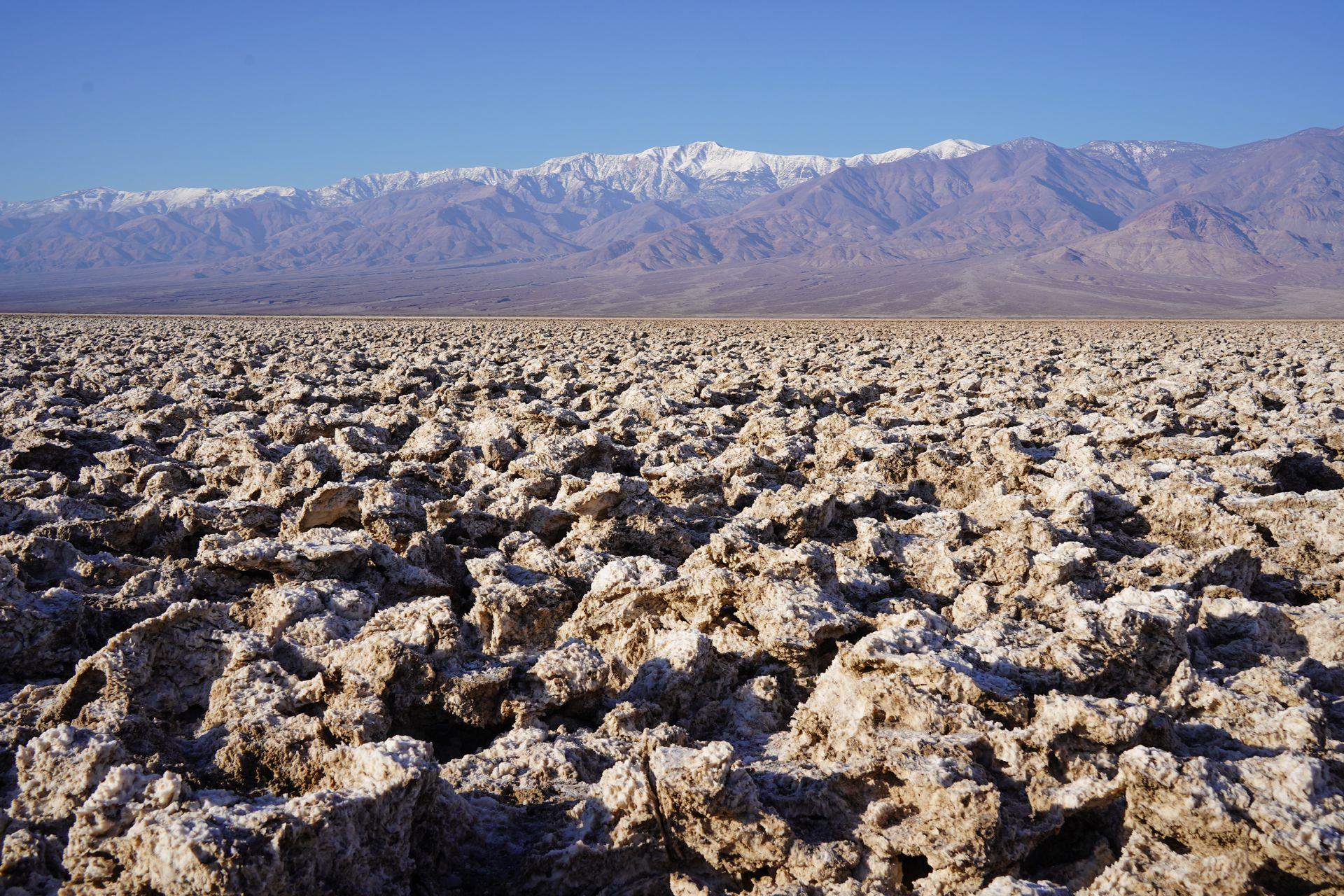 Looking out at unique textured salt formations at Devil's Golf Course in Death Valley.
