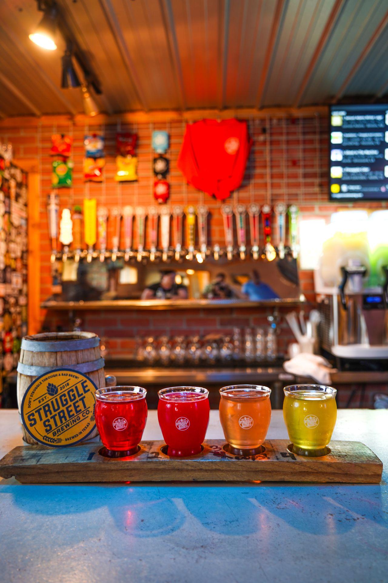 A flight of four colorful beers from Struggle Street Brewery