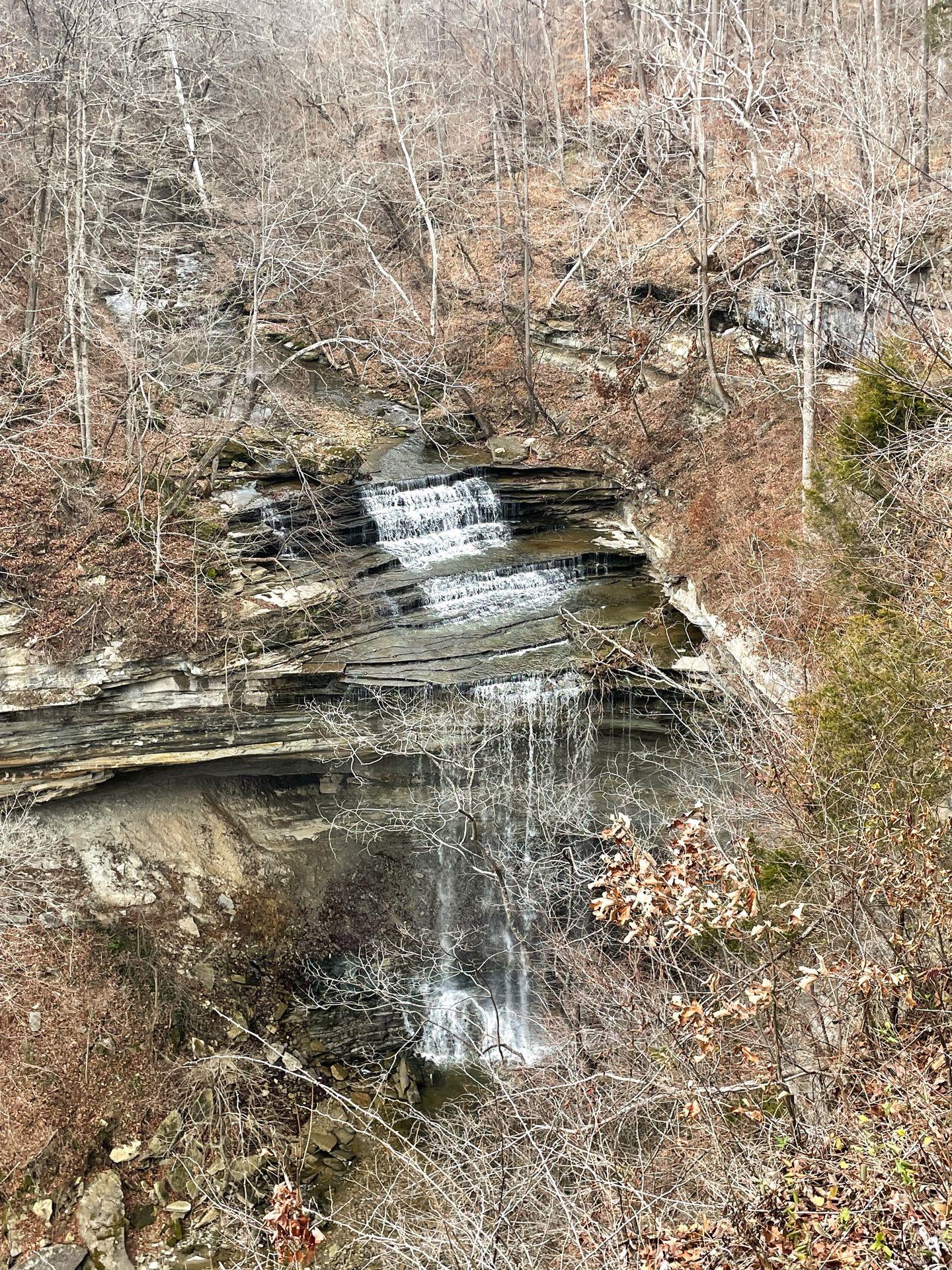 An overlook looking down at a waterfall in Clifty Falls State Park.