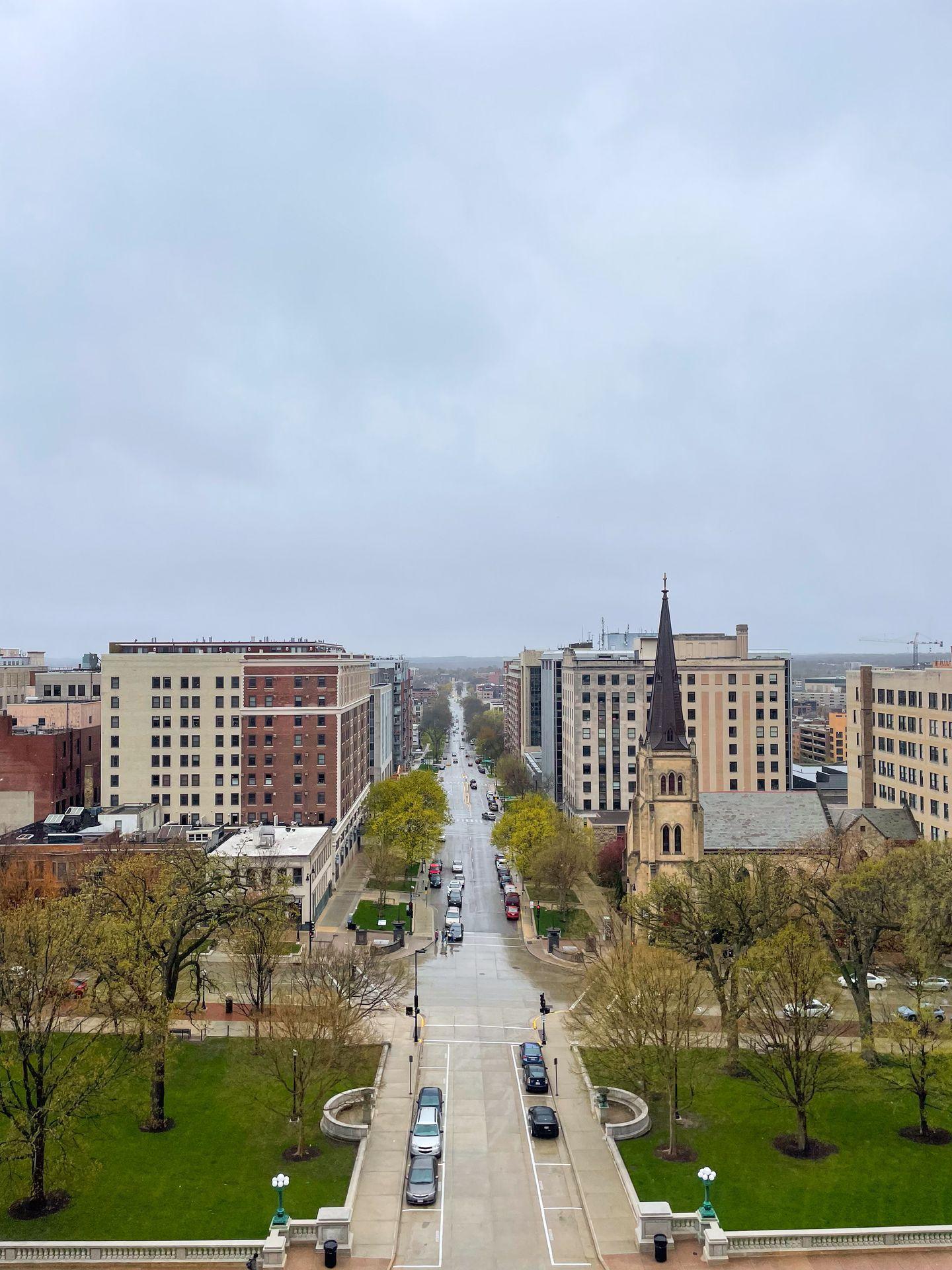 A view looking straight down a street in downtown Madison from the state capitol observation deck.