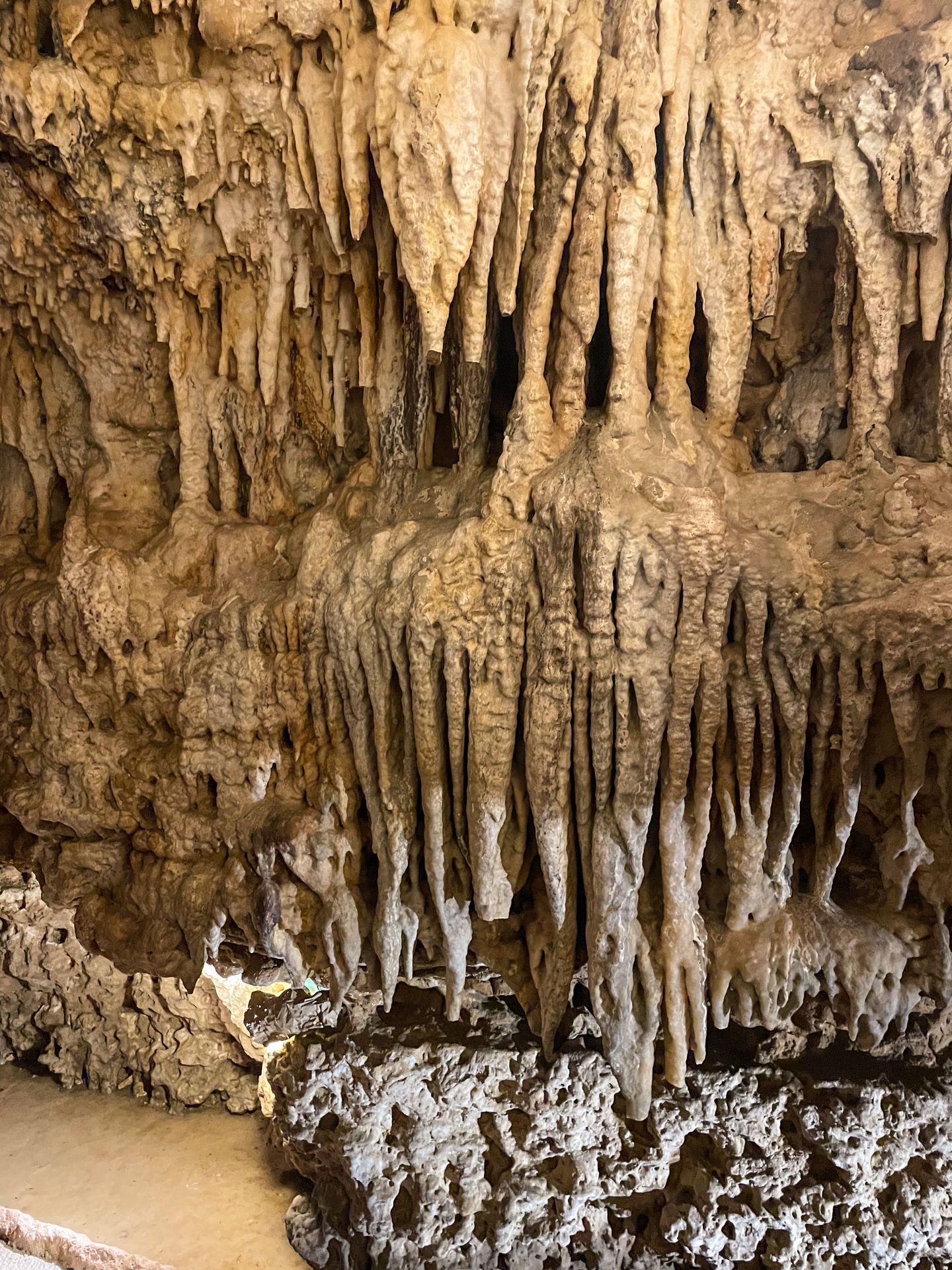 Several stalactites inside of Cave of the Mounds