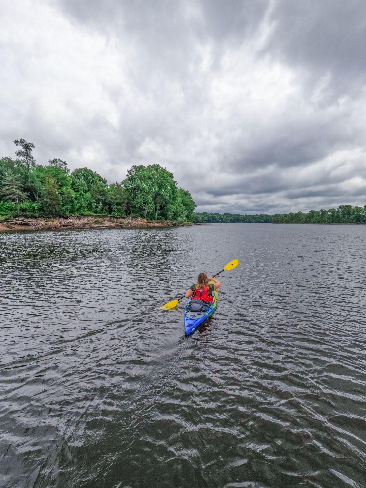 Lydia kayaking on the Mississippi River