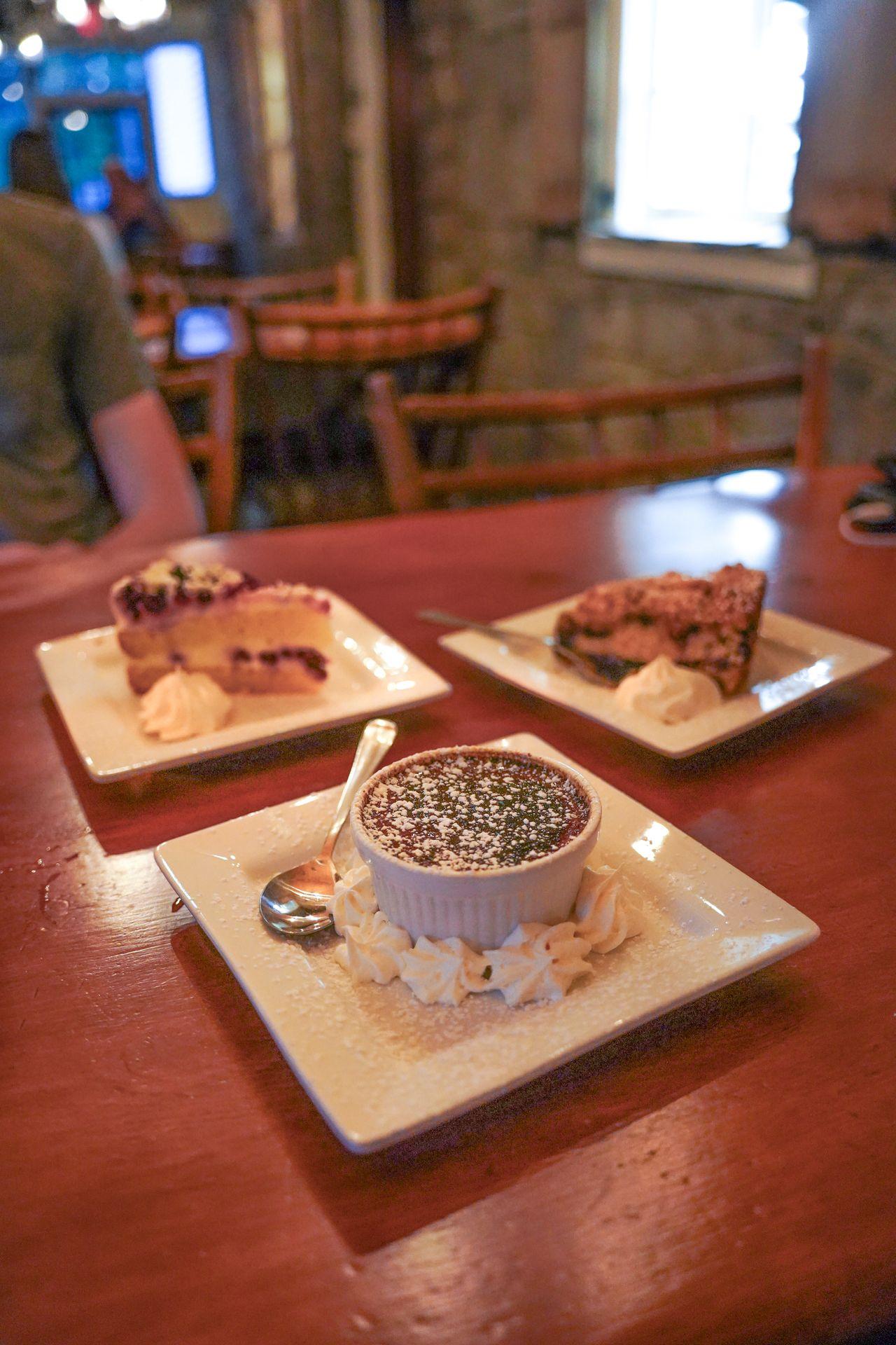 Creme Bruelee and two slices of cake from Duffy's Tavern.