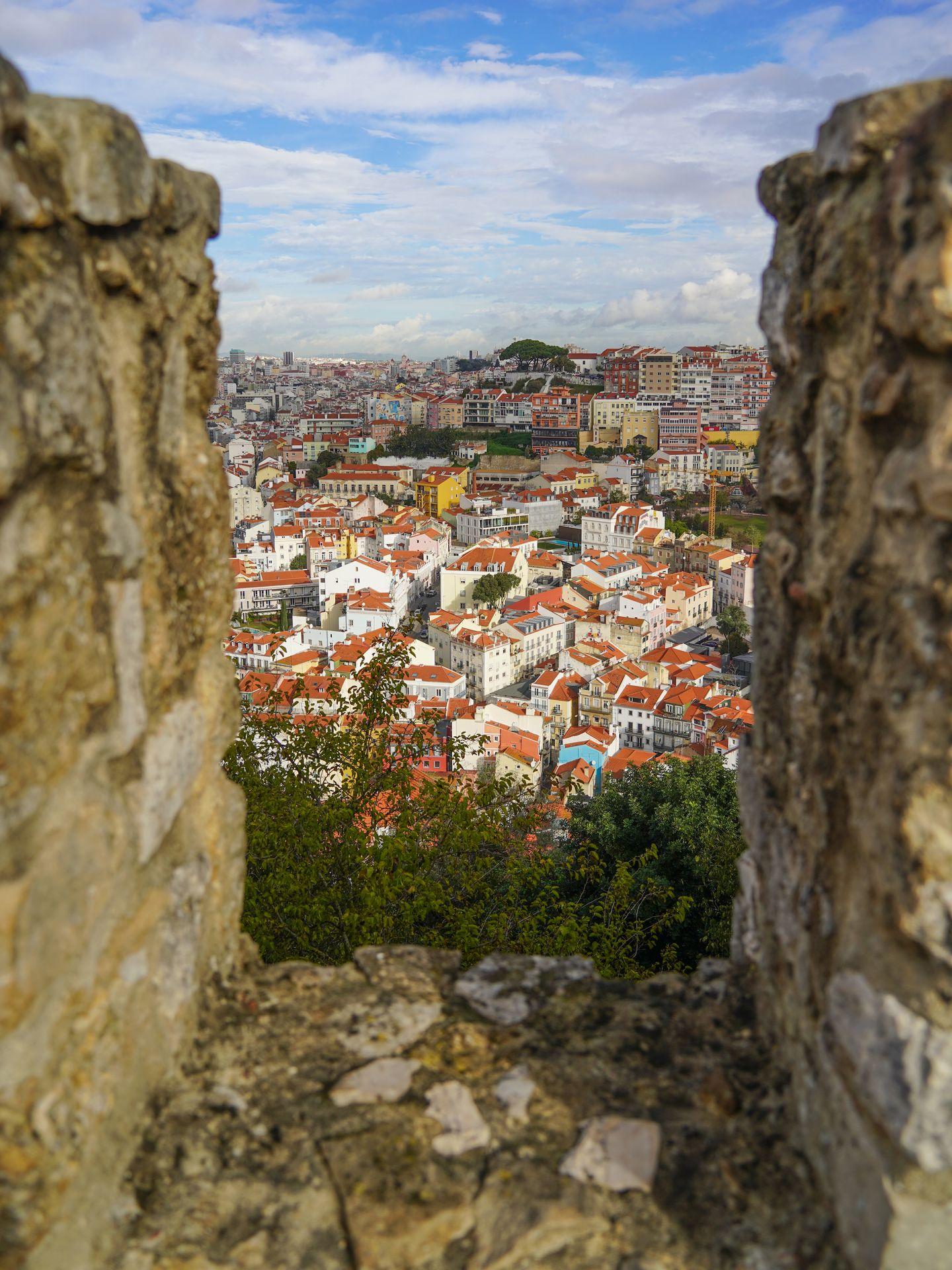 Looking through the castle walls at the city of Lisbon