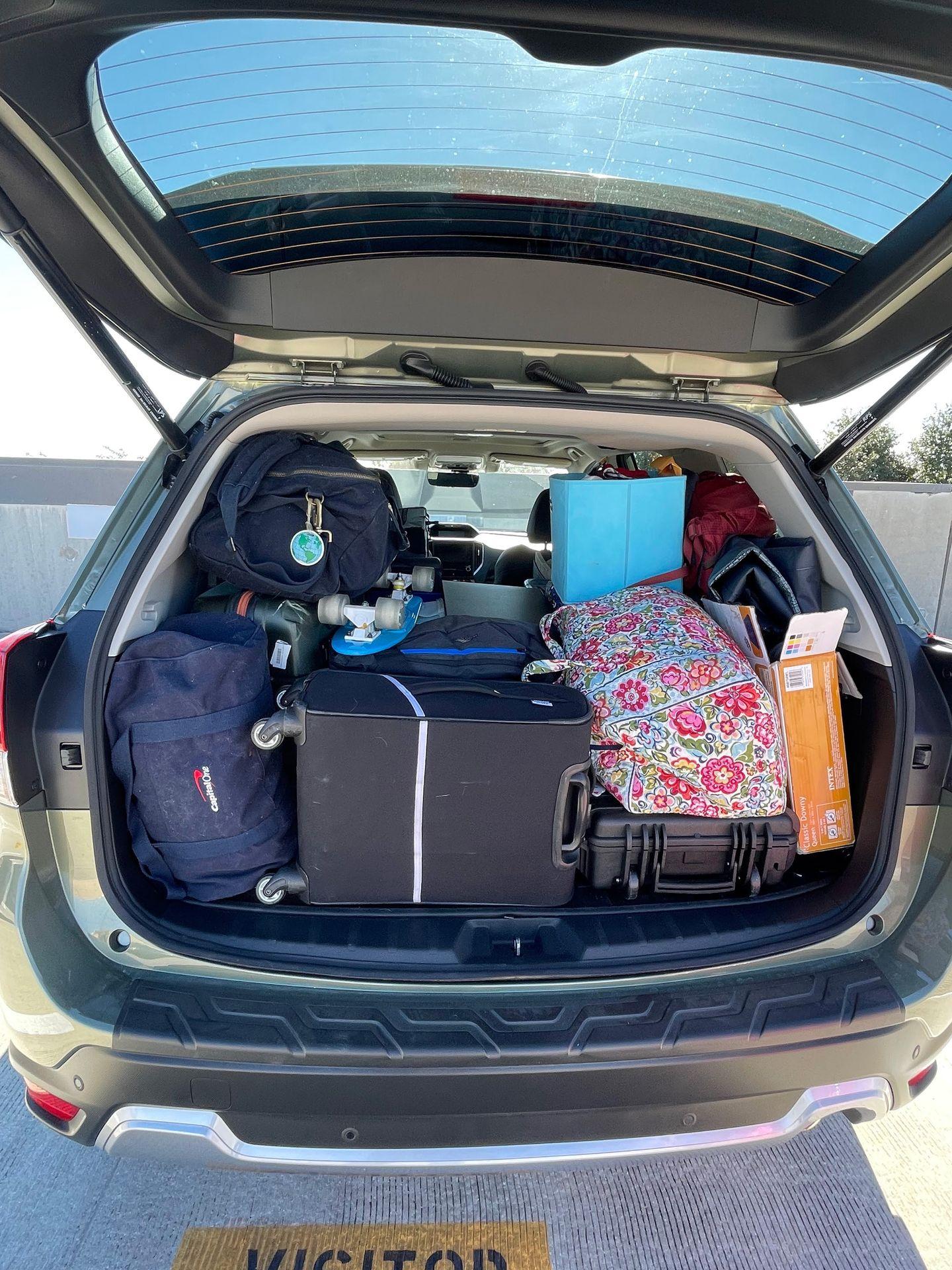 A look into the back of our Subaru, full of suitcases, duffle bags and boxes.